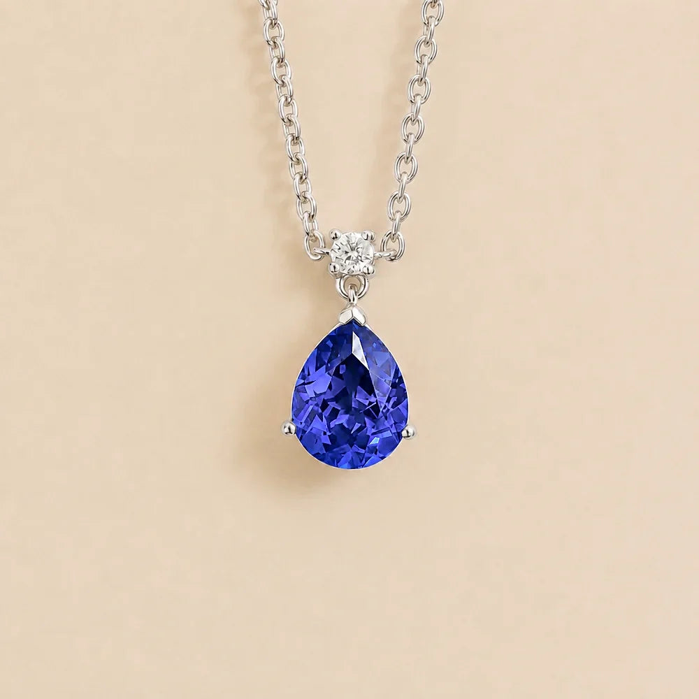 Pisa Royal Blue Sapphire & Diamond Pear Drop Pendant Necklace In White Gold