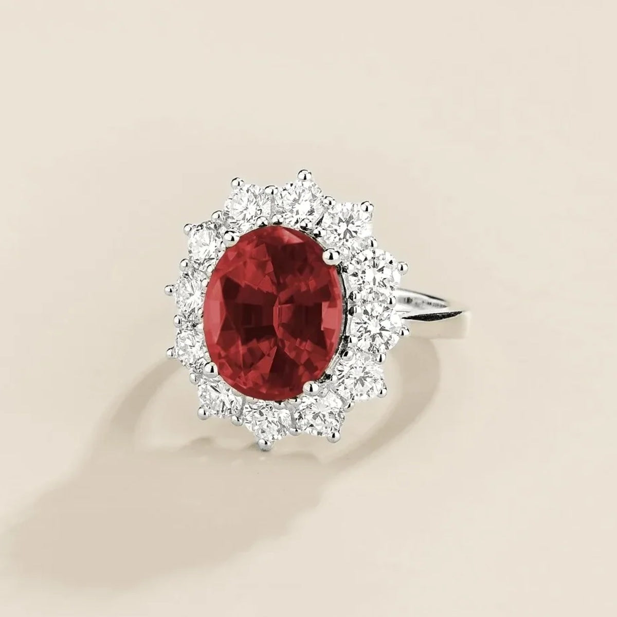 Oda Ruby Oval & Diamond Halo Ring – angle view
