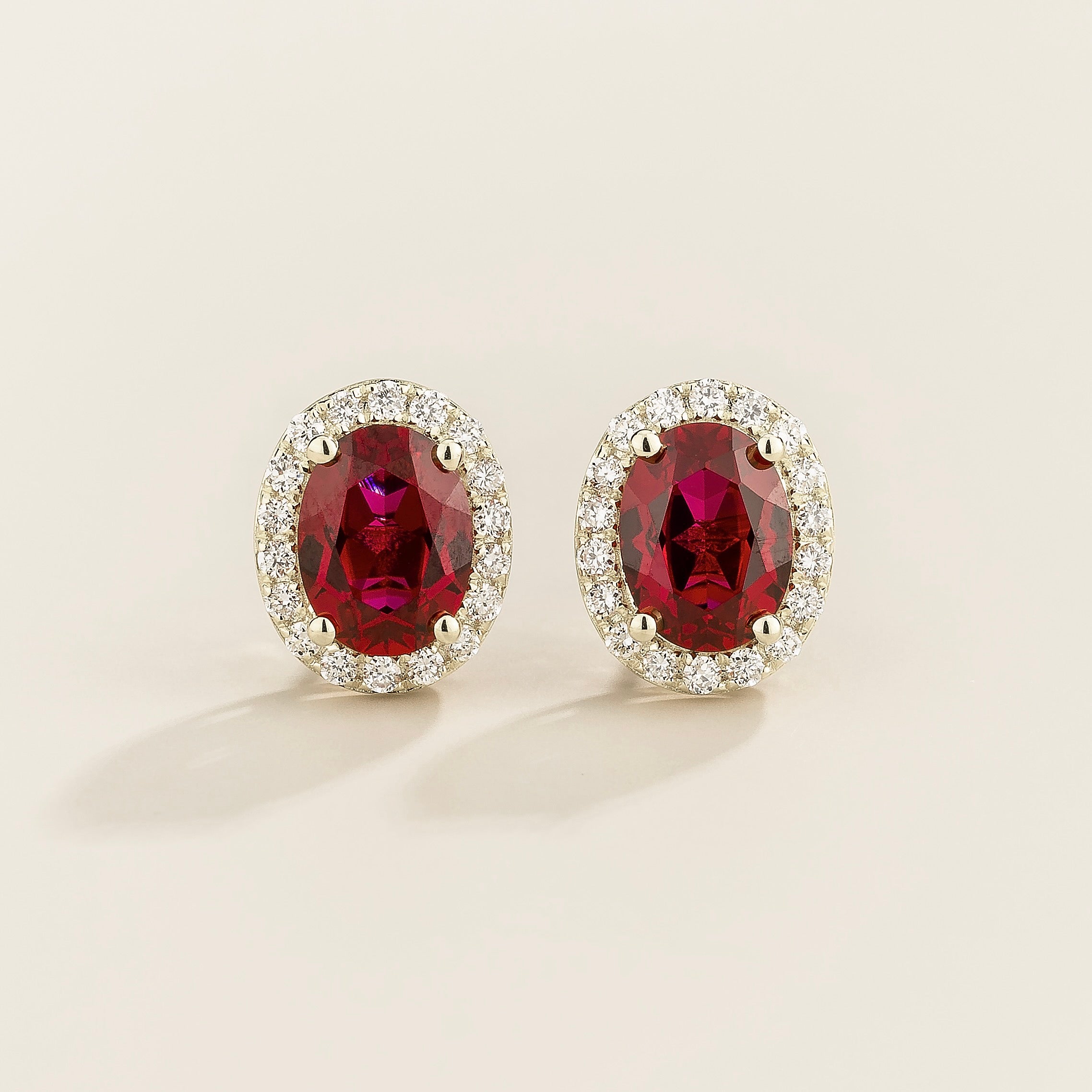 Mina Oval Ruby & Diamond Halo Earrings In White Gold