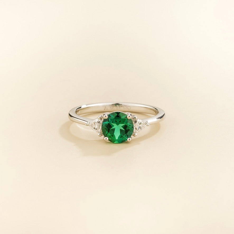 Lola Round Emerald Three-Stone Ring with Trillion Diamonds in White Gold