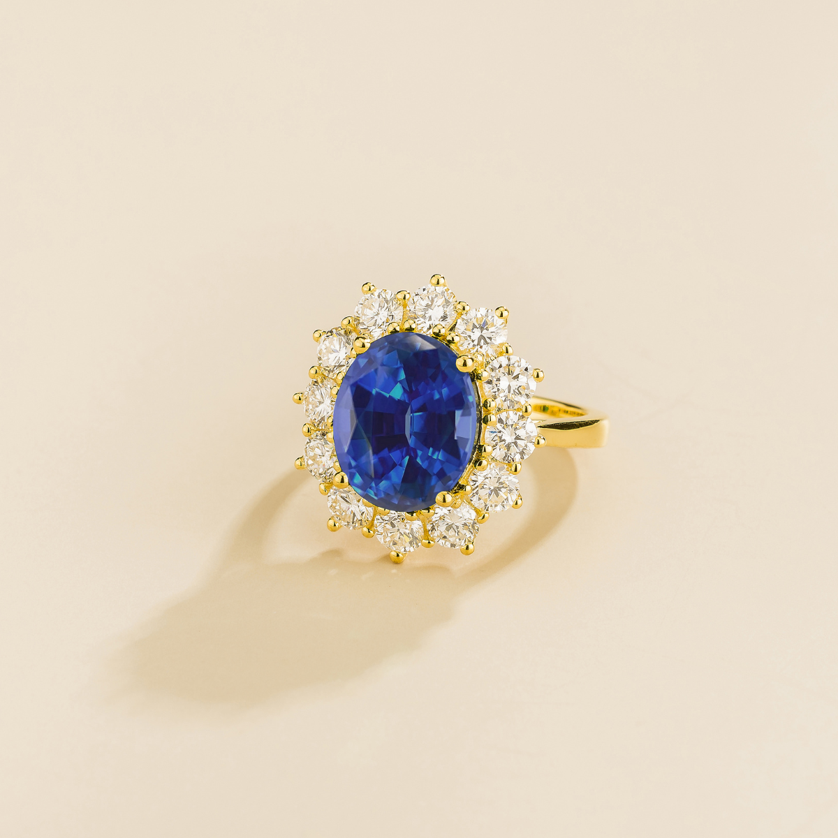 Oda Blue Sapphire Oval & Diamond Halo Ring In Gold