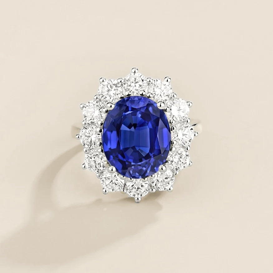 Oda Blue Sapphire Oval & Diamond Halo Ring | Juvetti
