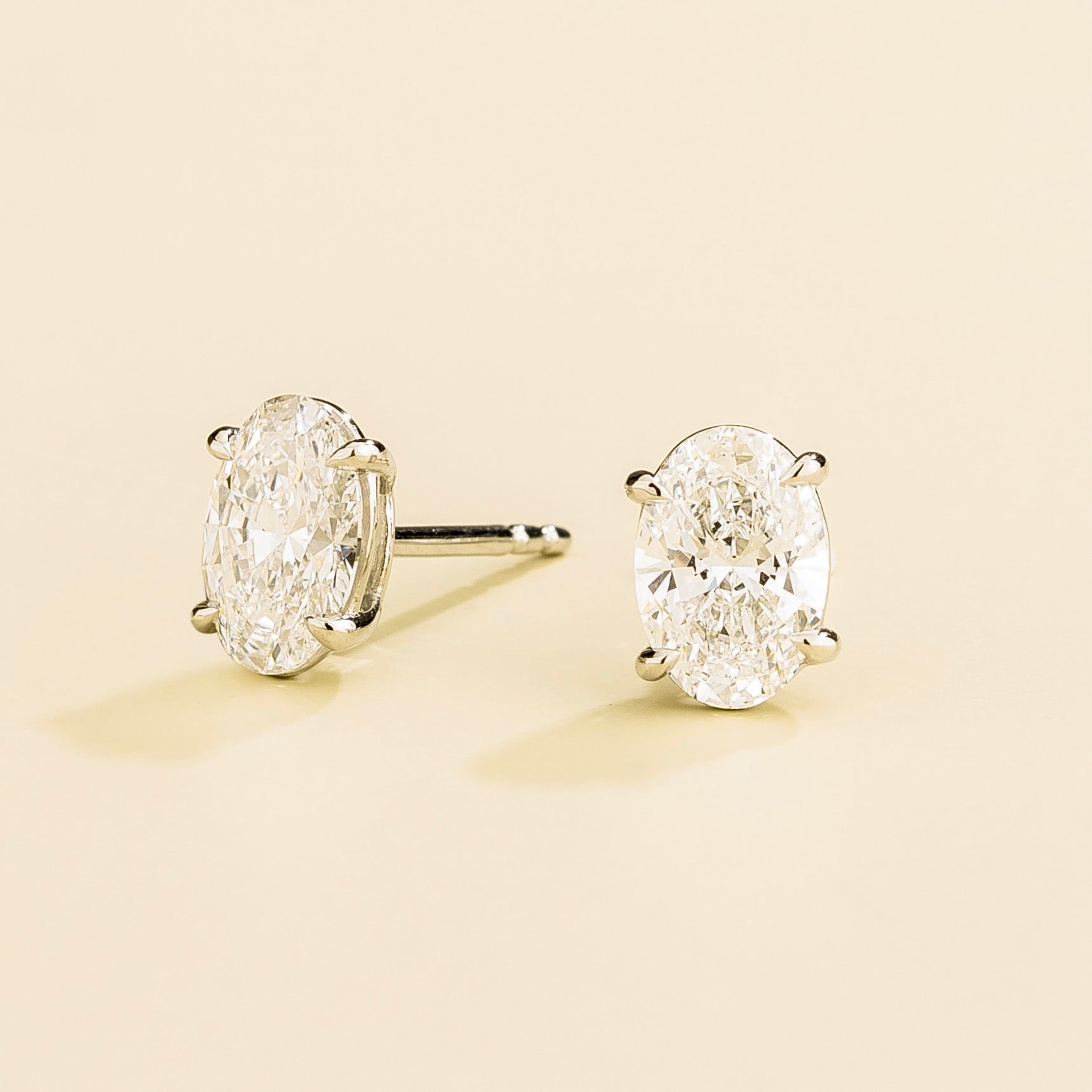 Ovo Diamond Oval Stud Earrings in White Gold