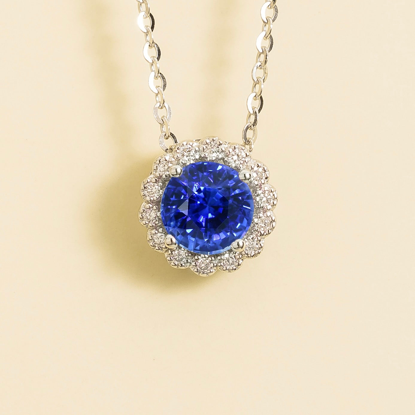 Solen Blue Sapphire Round & Diamond Halo Pendant Necklace in White Gold