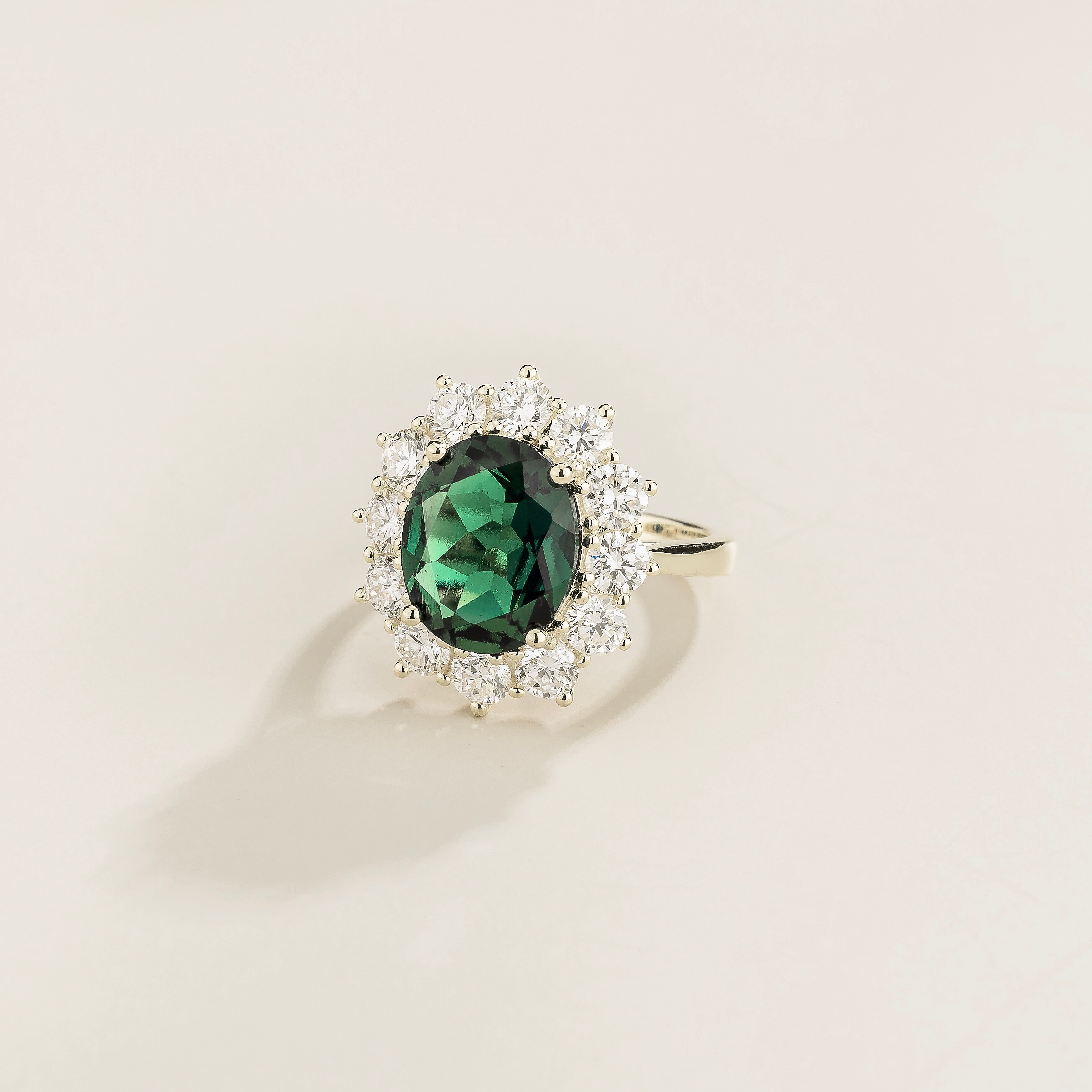 Oda Emerald Oval & Diamond Halo Ring in White Gold