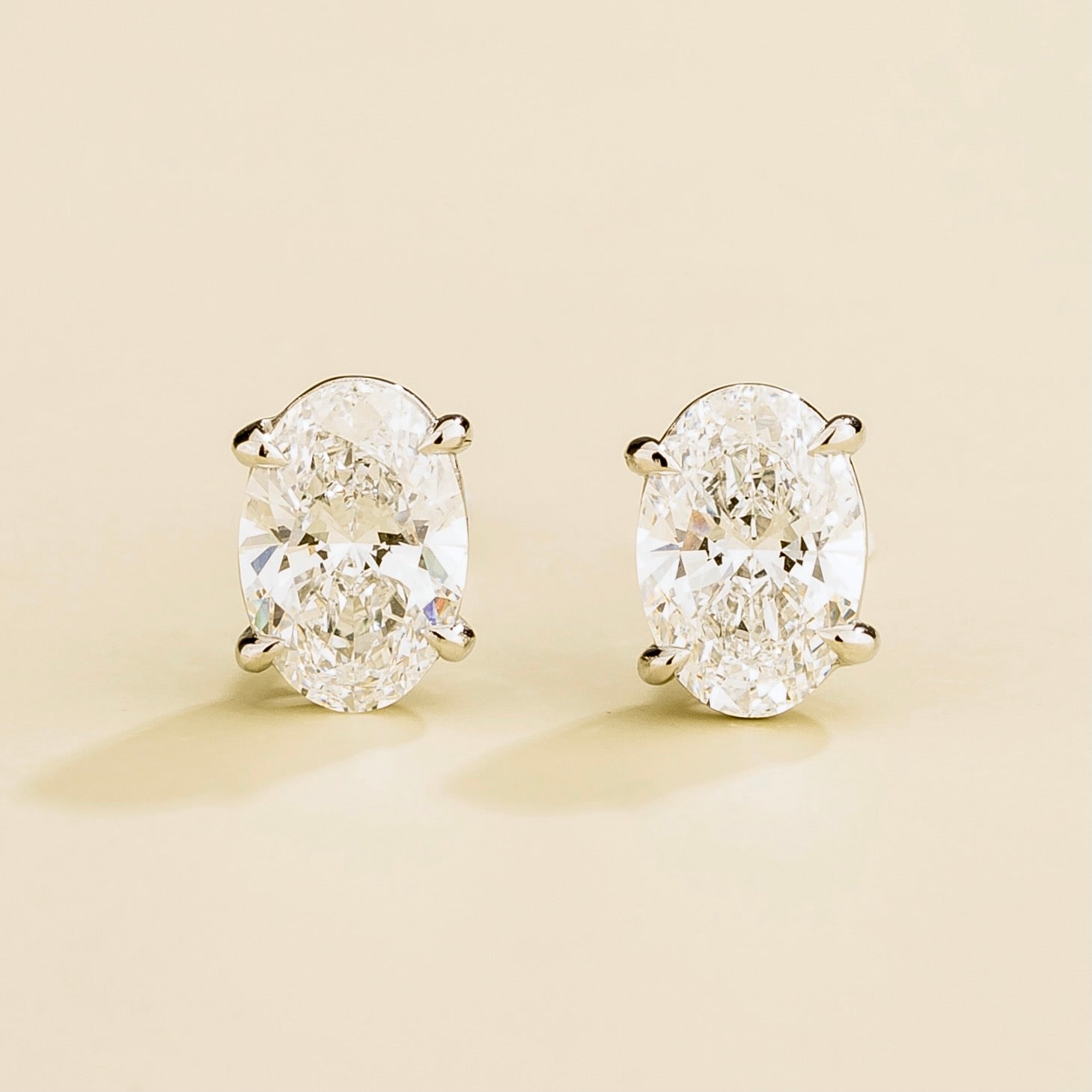 Ovo Diamond Oval Stud Earrings in White Gold