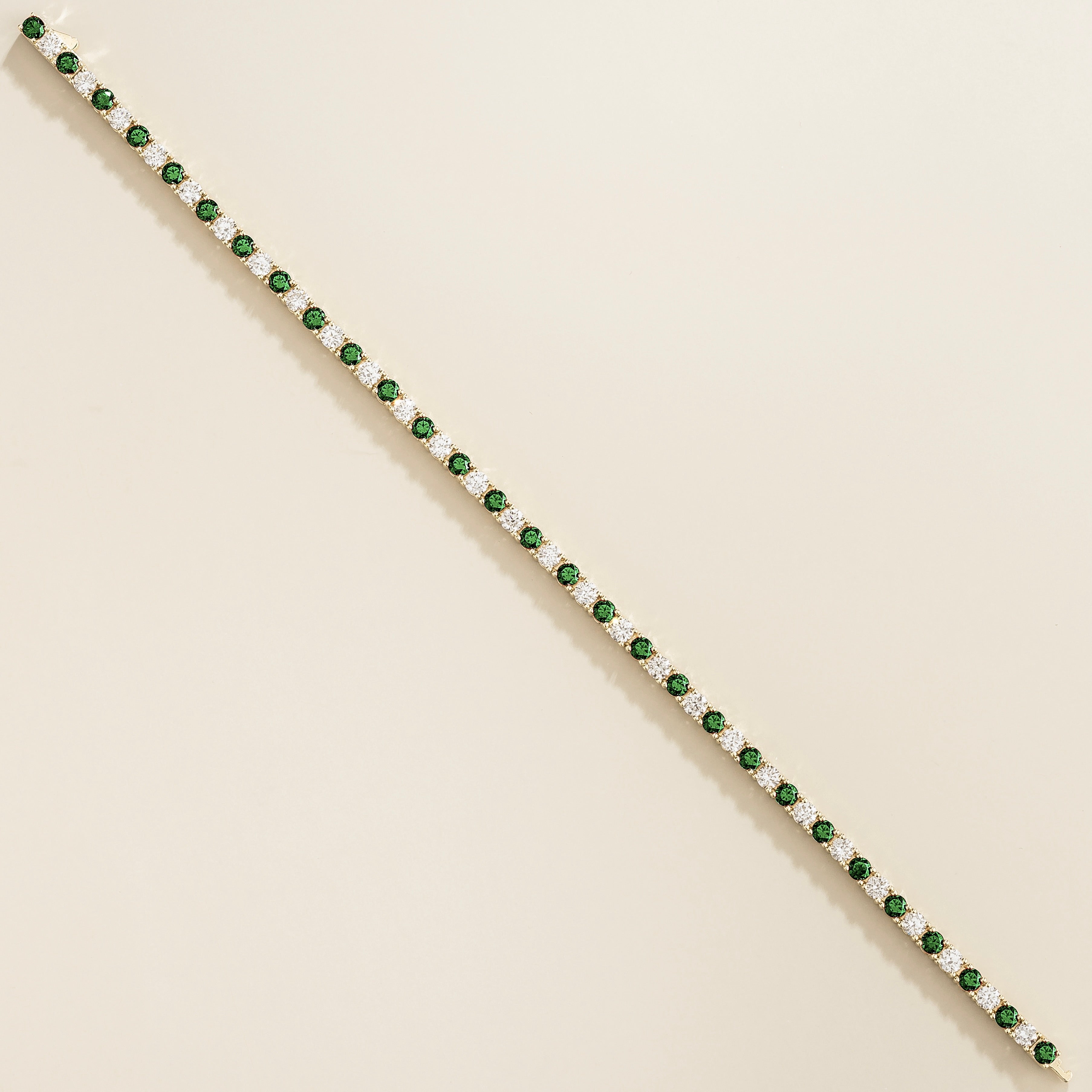 Ciclo Emerald & Diamond Round Tennis Bracelet in White Gold
