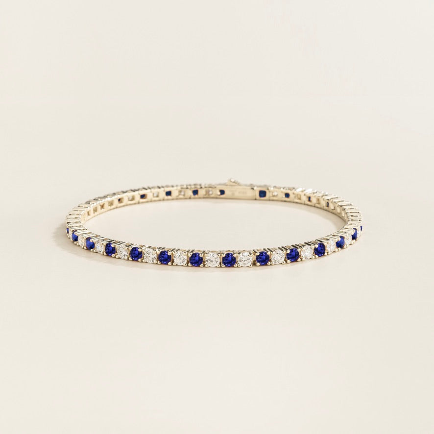 Round lab-grown blue sapphire and diamond tennis bracelet in white gold | Juvetti London