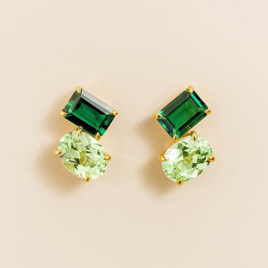 Emerald-cut and oval lab-grown emerald and green sapphire two-stone earrings, Buchon design in gold | Juvetti London