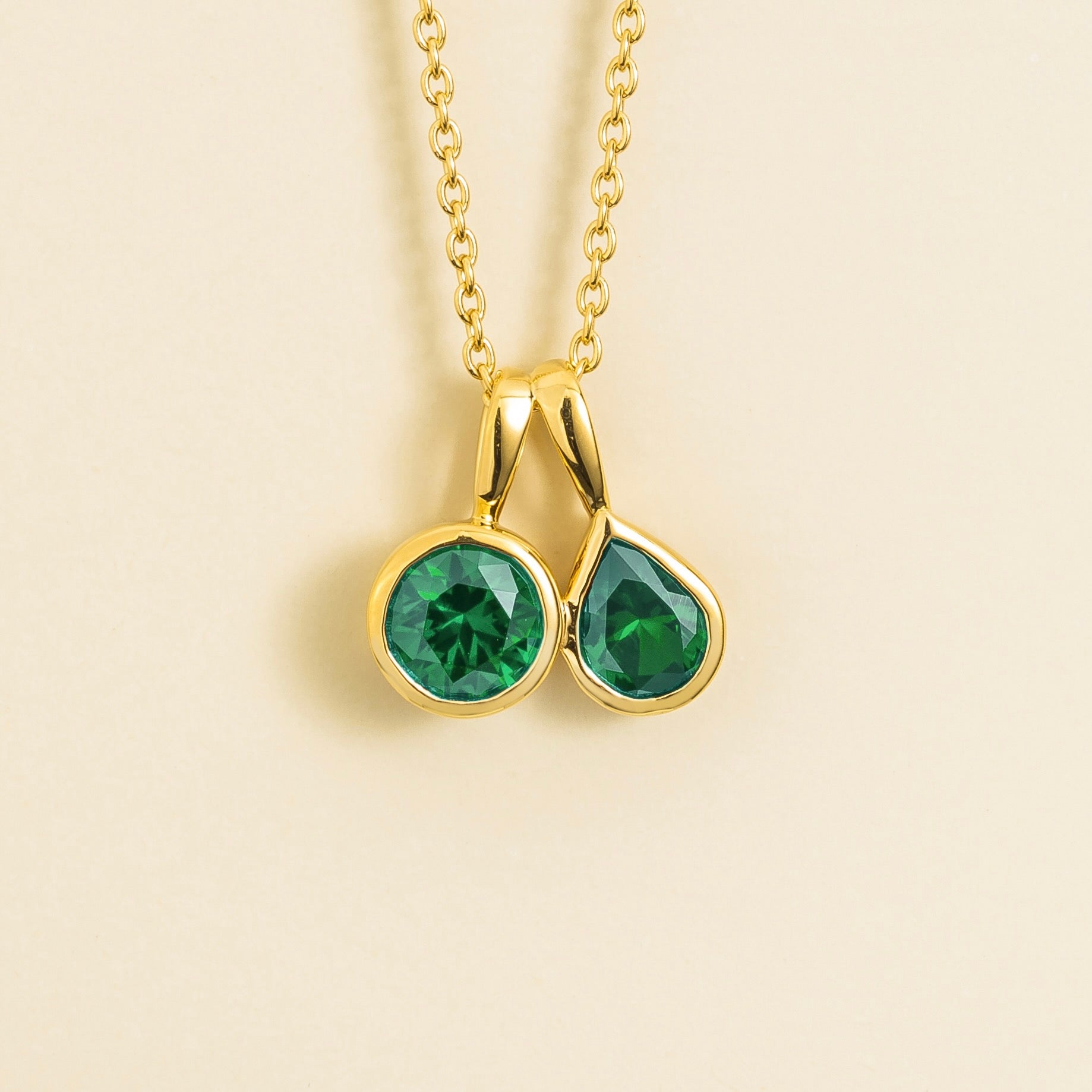 Prunus Emerald Round & Pear Cut Bezel Set Two-Stone Pendant Gold Necklace