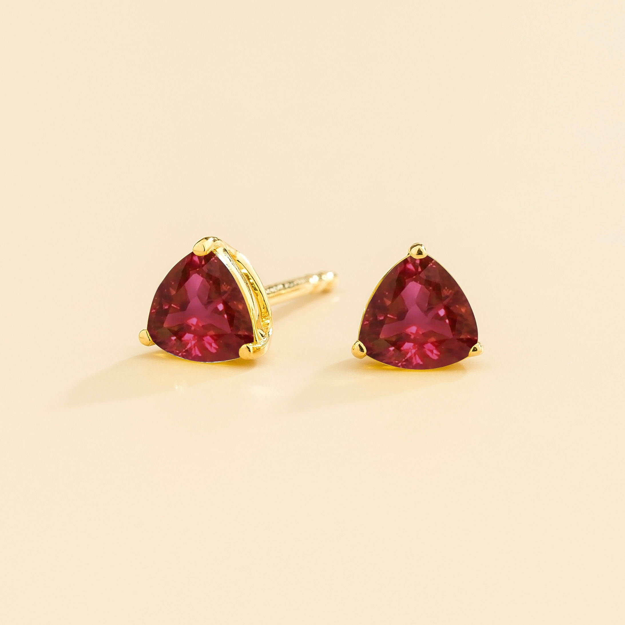 Trillion Ruby Solitaire Stud Earrings in Gold