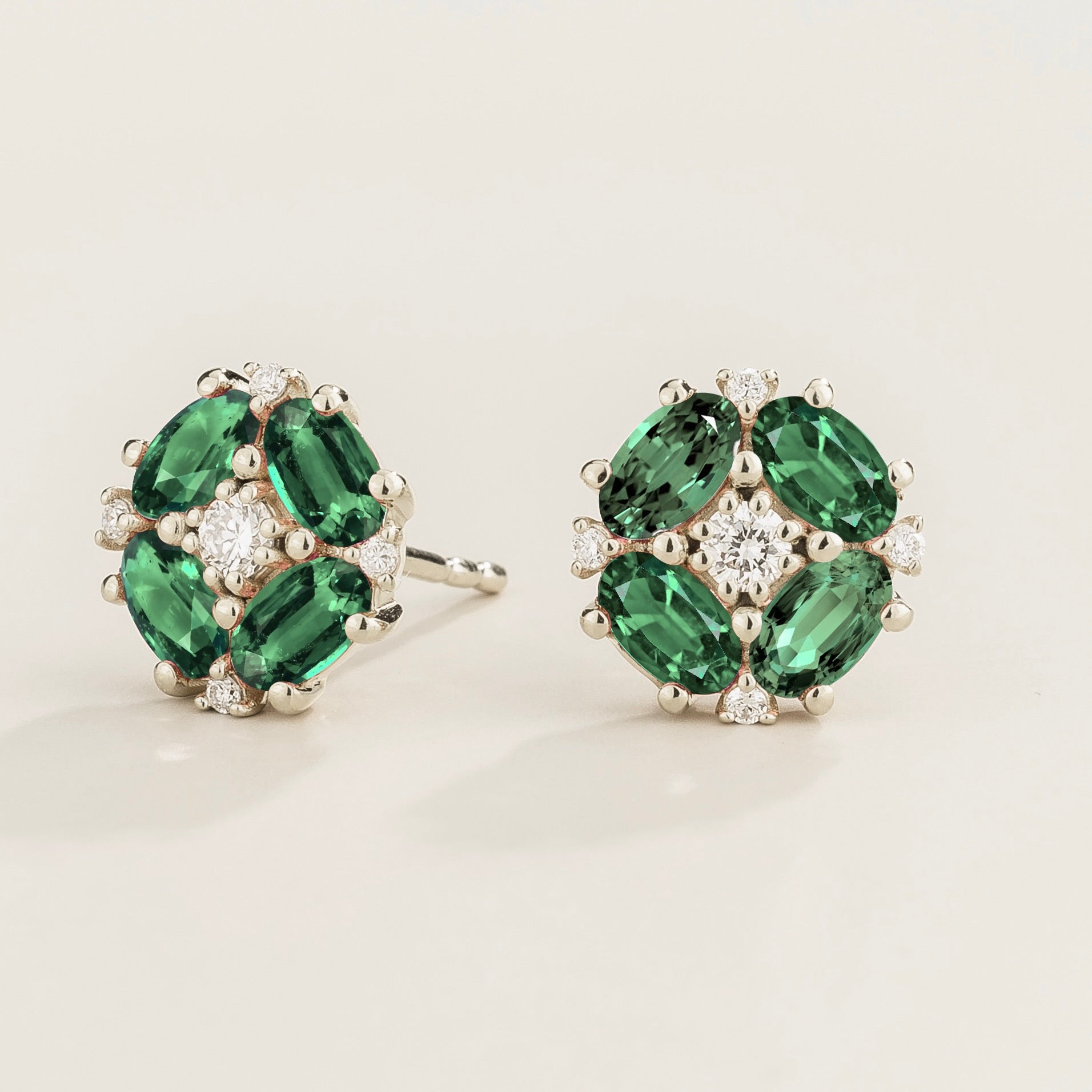 Pristi Oval Emerald & Diamond Cluster Earrings in White Gold