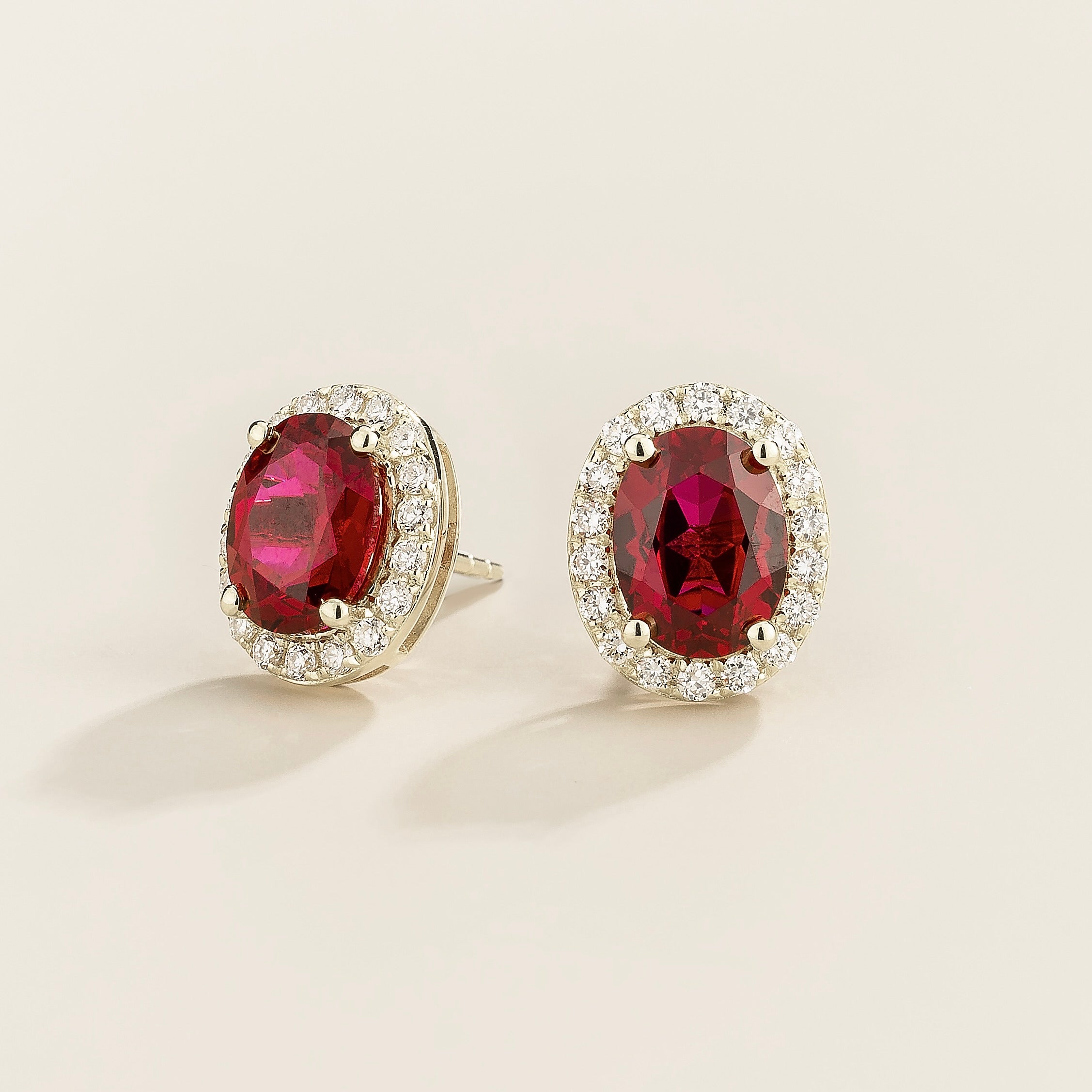 Mina Oval Ruby & Diamond Halo Earrings In White Gold