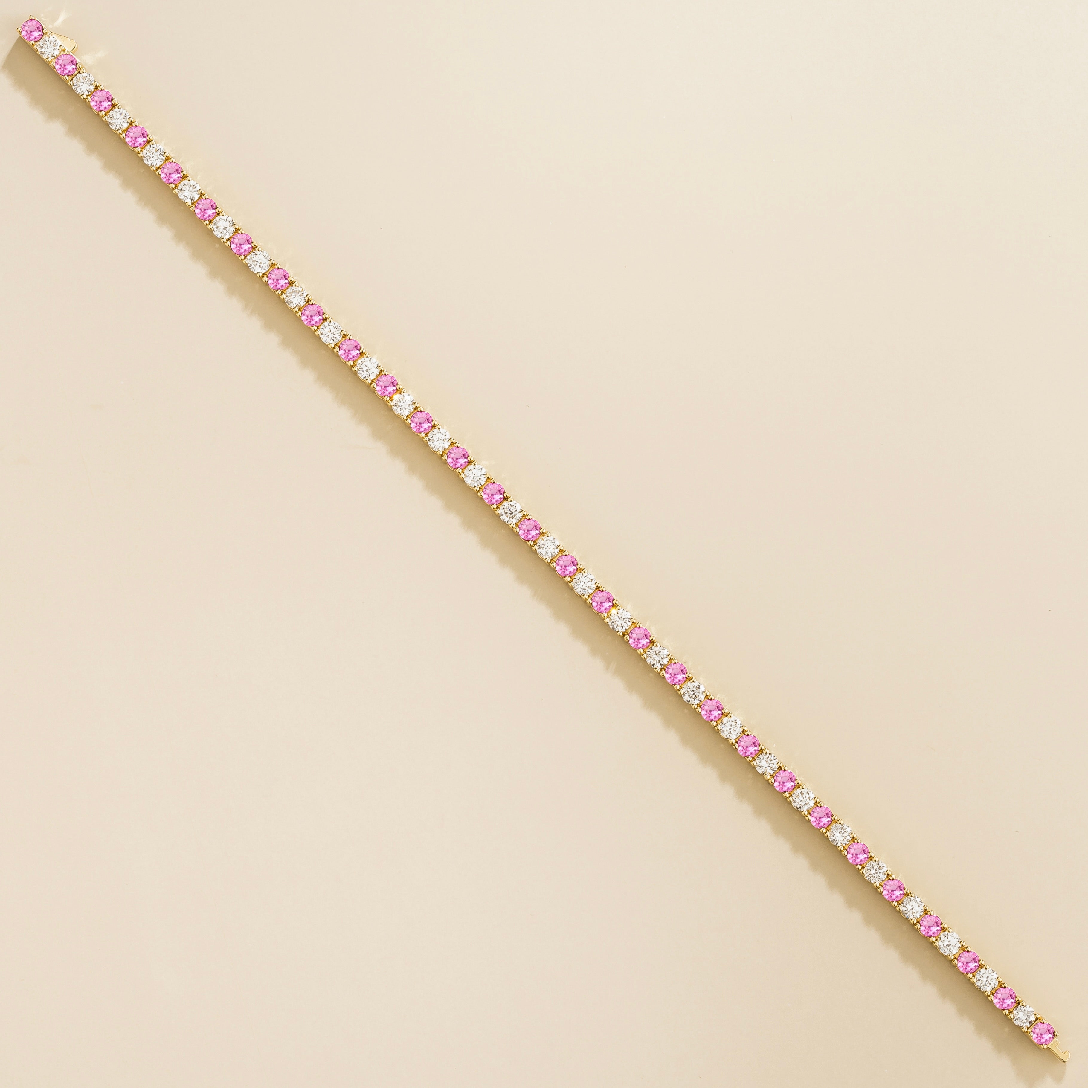 Ciclo Pink Sapphire & Diamond Round Tennis Bracelet in Gold
