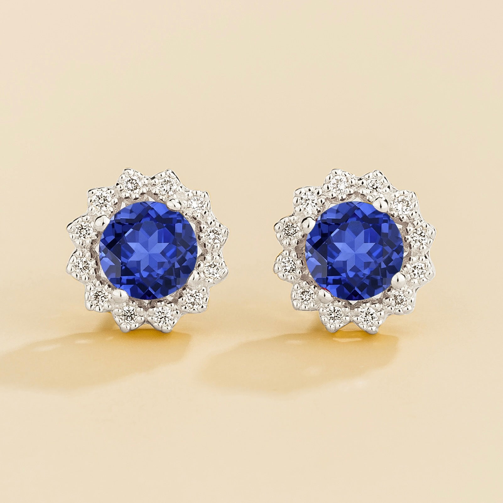 Solen Blue Sapphire Round & Diamond Halo Stud Earrings in White Gold
