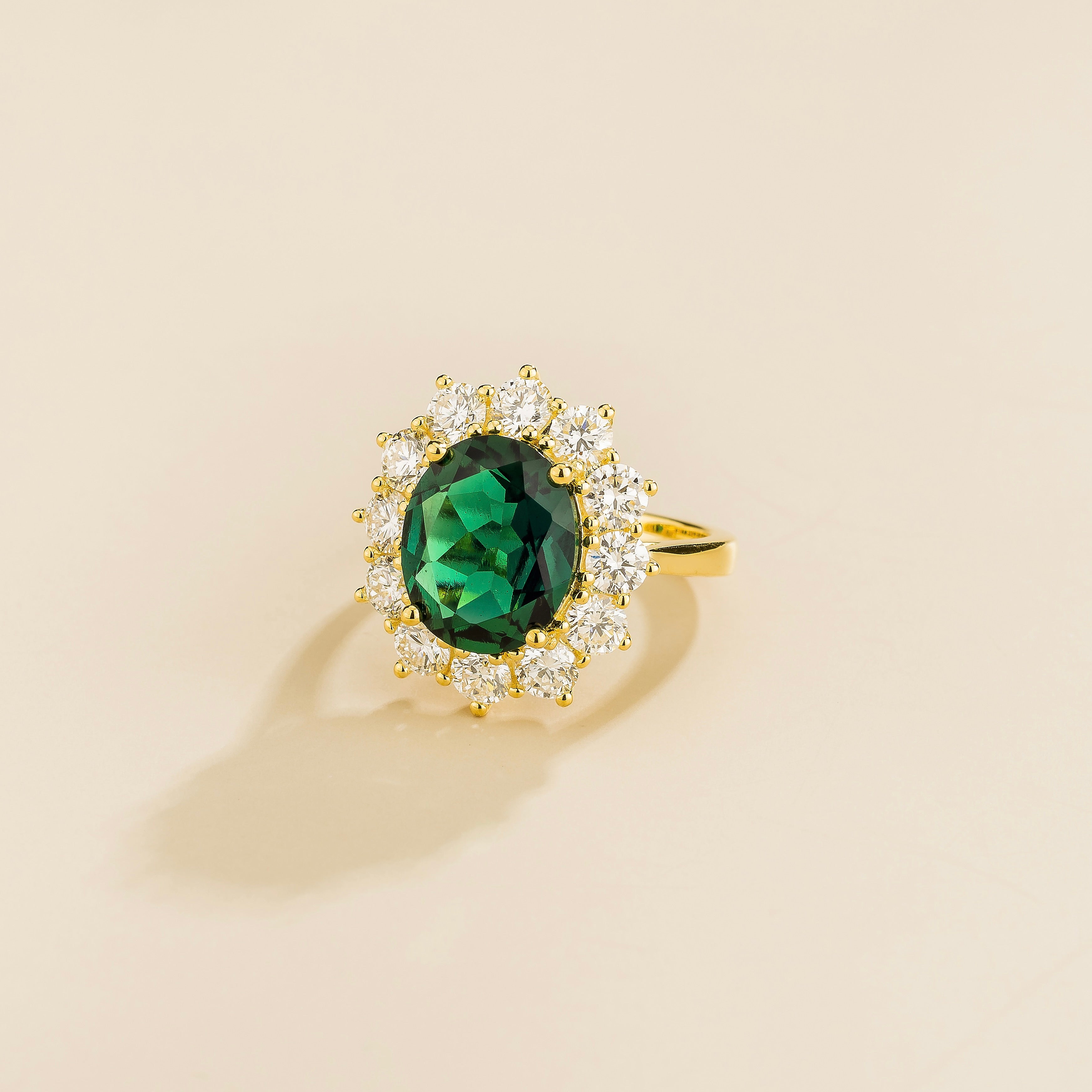 Oda Emerald Oval & Diamond Halo Ring in Gold