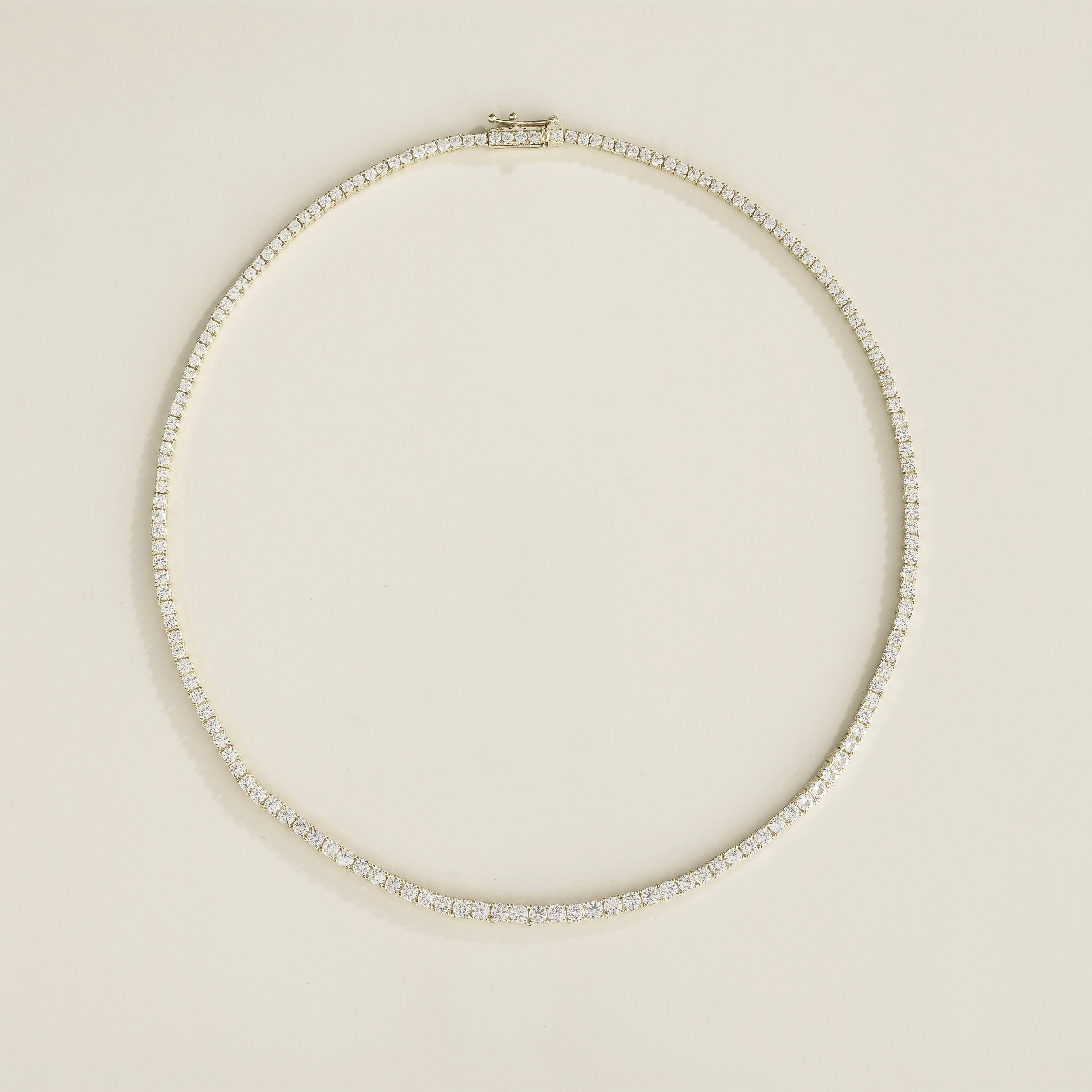 Round lab-grown white sapphire tennis necklace, Ciclo design in white gold | Juvetti London