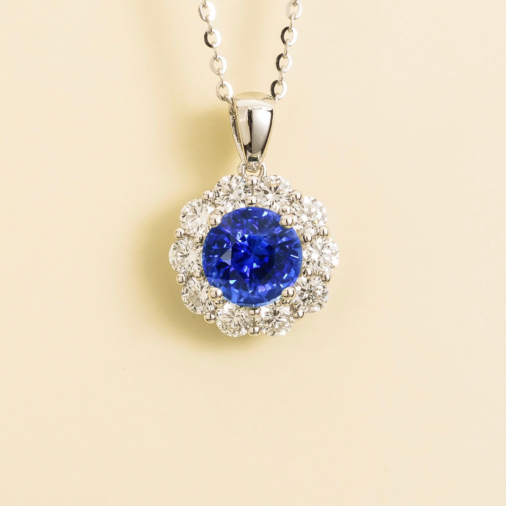 Floret Blue Sapphire Round & Diamond Halo Pendant Necklace in White Gold