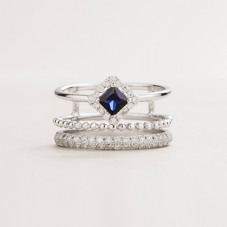 Princess-cut lab-grown blue sapphire stacking ring with diamond pavé in white gold | Juvetti London