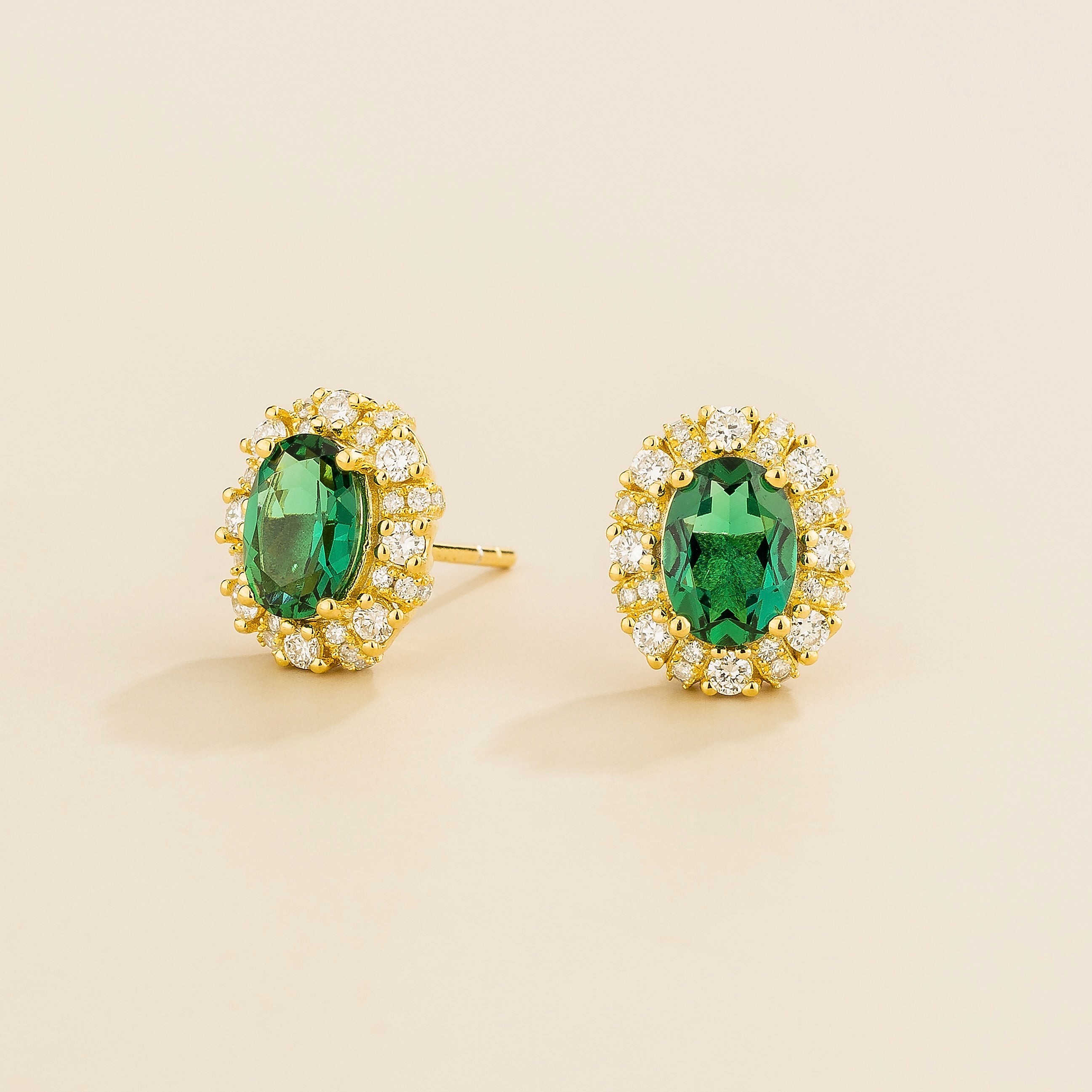 Viva Oval Emerald Halo Stud Earrings with Diamond Accents in Gold