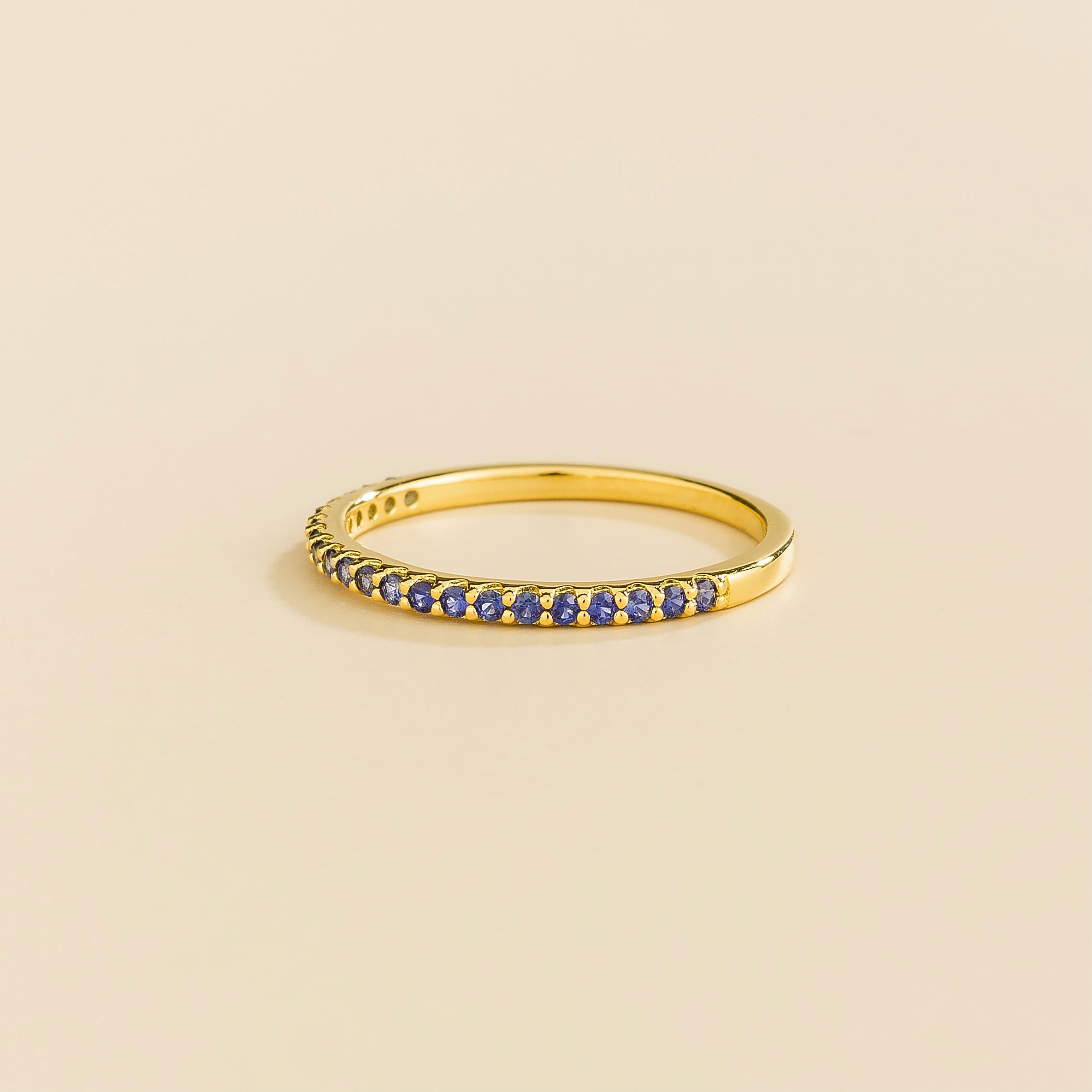 Ciclo Blue Sapphire Half Eternity Band in Gold