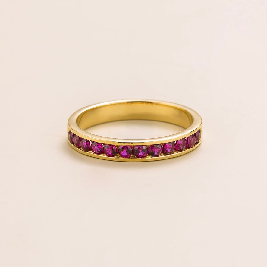 Lab-grown ruby channel-set band Margo ring in gold | Juvetti London