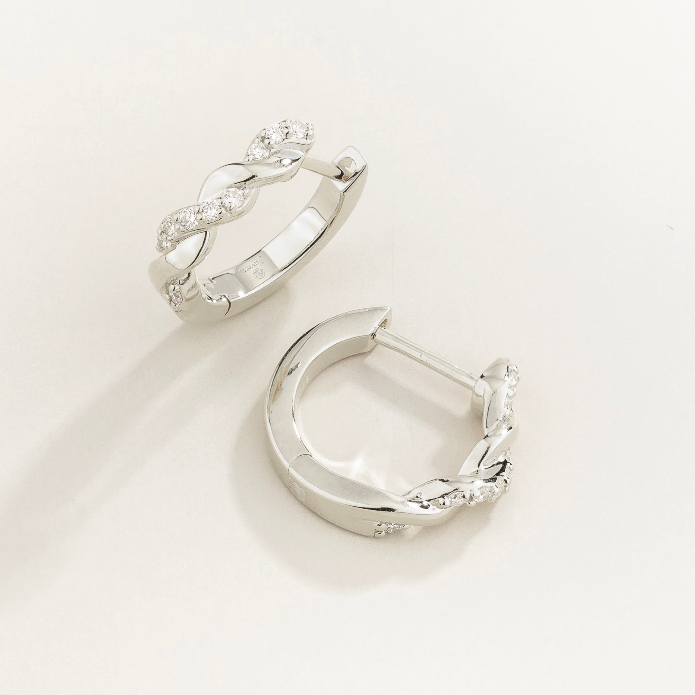 Twist Diamond Huggie Hoop Earrings in White Gold