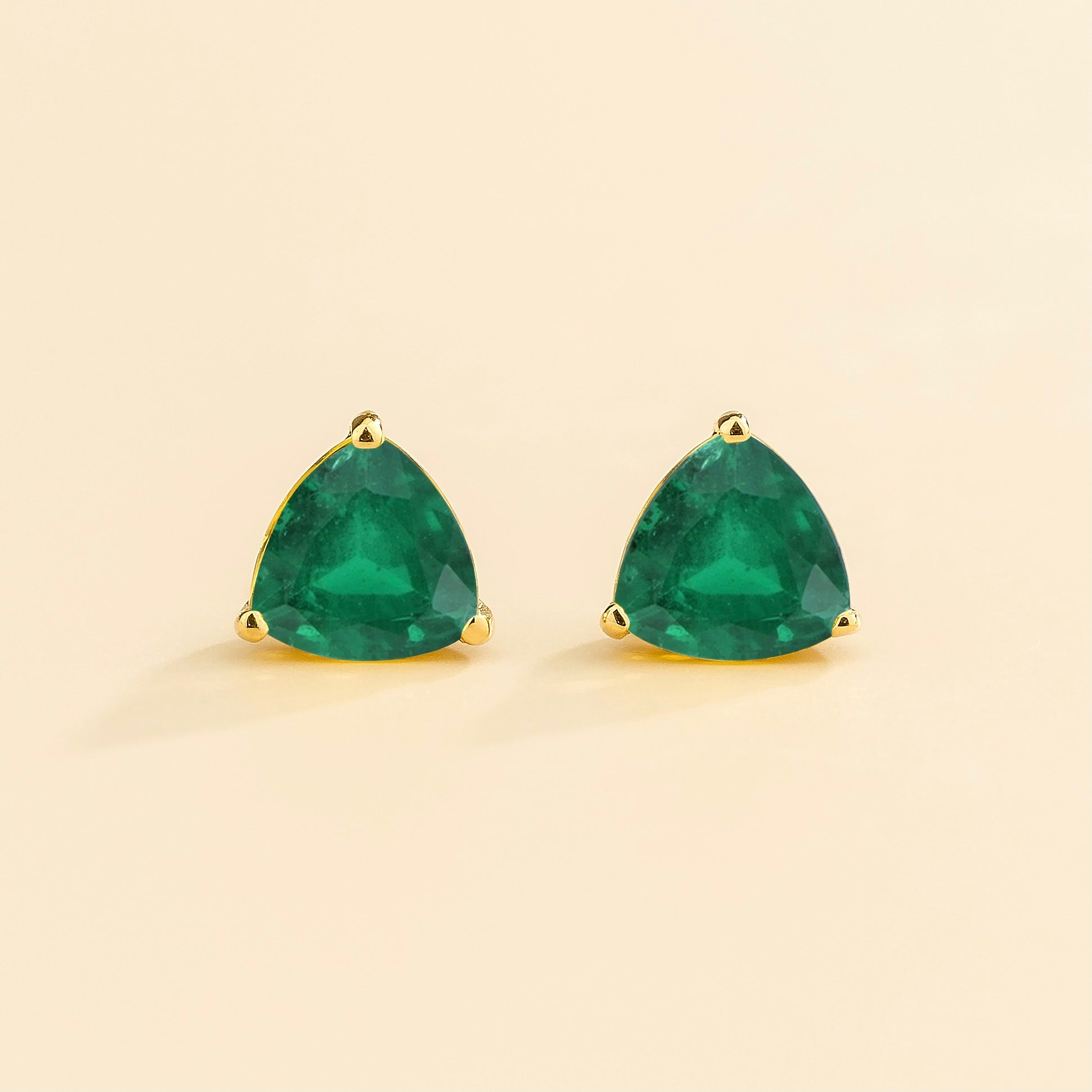 Trillion Emerald Stud Earrings in Gold