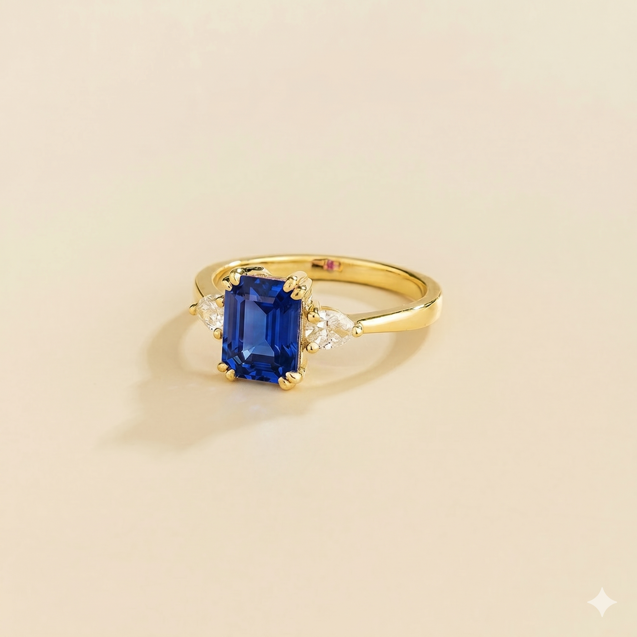 Ailes Blue Sapphire Emerald-Cut Ring with Pear Side Diamonds in Gold