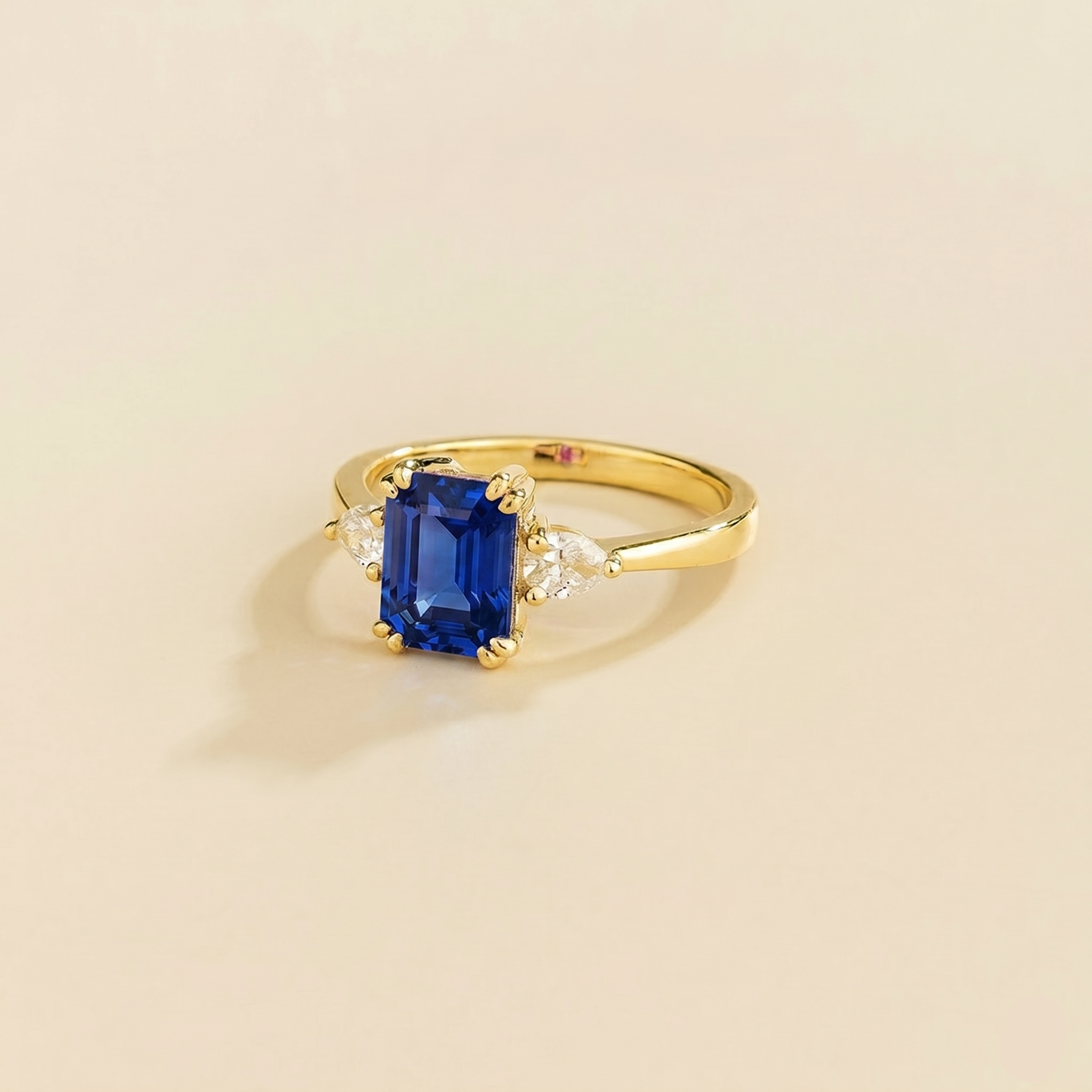 Ailes Blue Sapphire Emerald-Cut Ring with Pear Side Diamonds in Gold