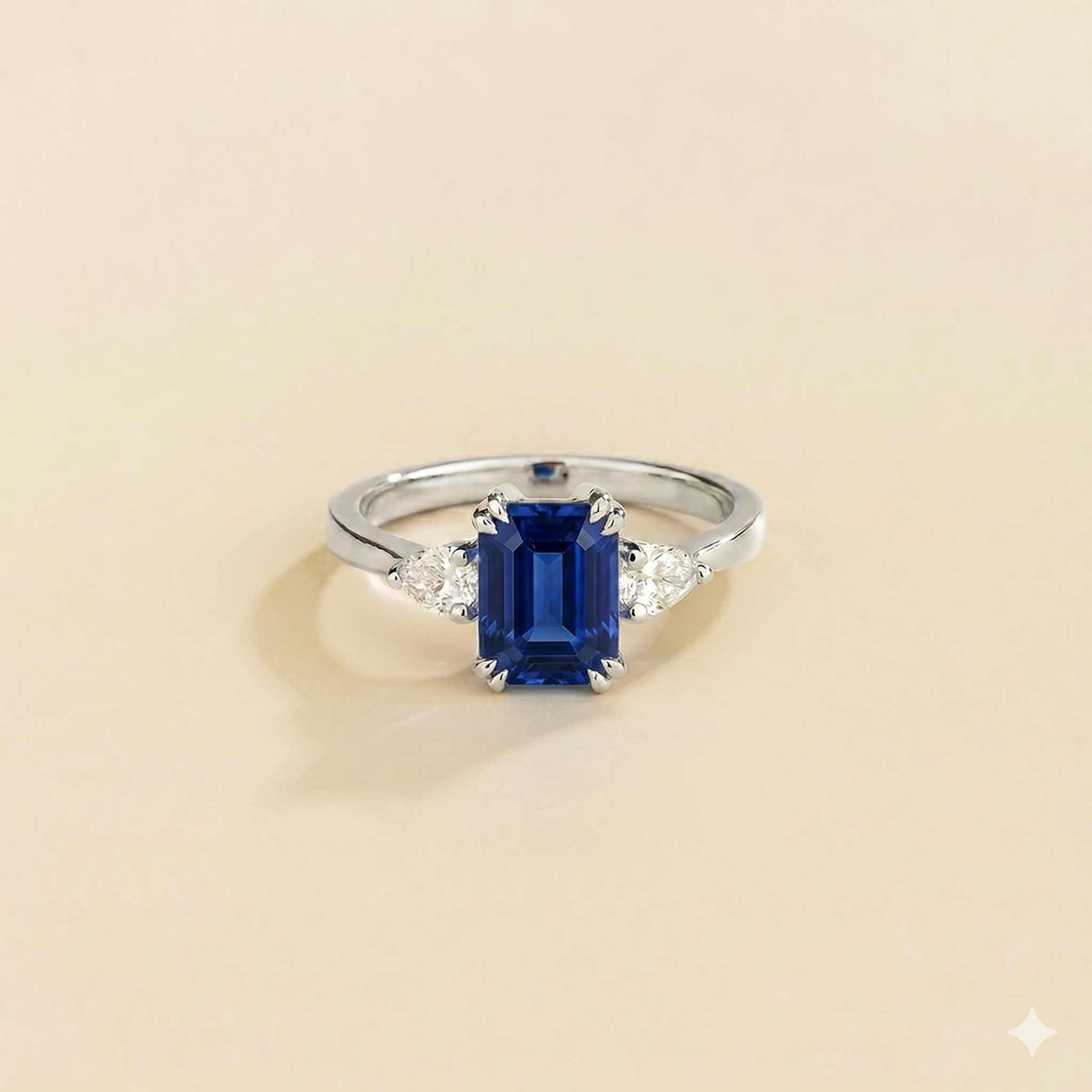Ailes Blue Sapphire Emerald-Cut Ring with Pear Side Diamonds in White Gold