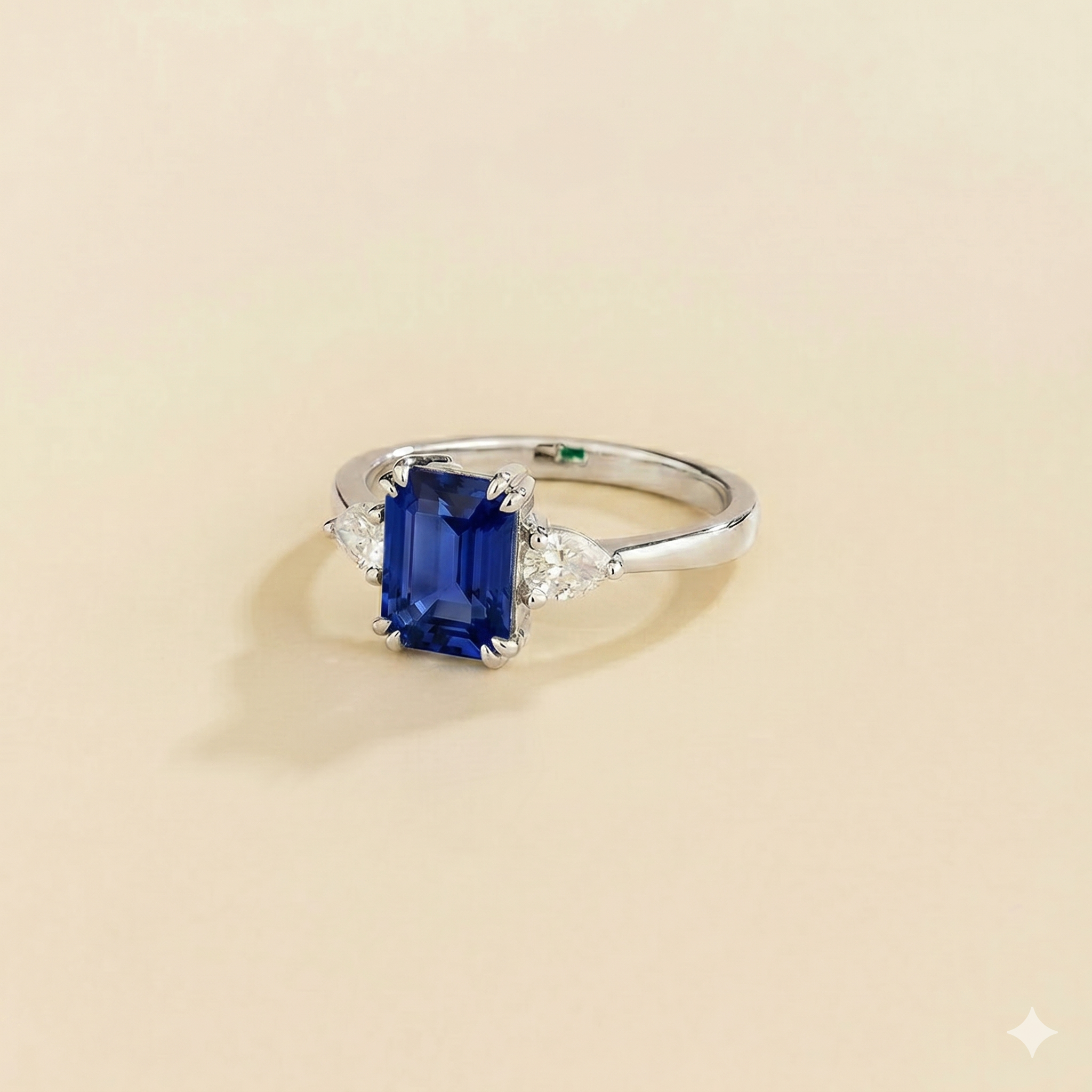 Ailes Blue Sapphire Emerald-Cut Ring with Pear Side Diamonds in White Gold