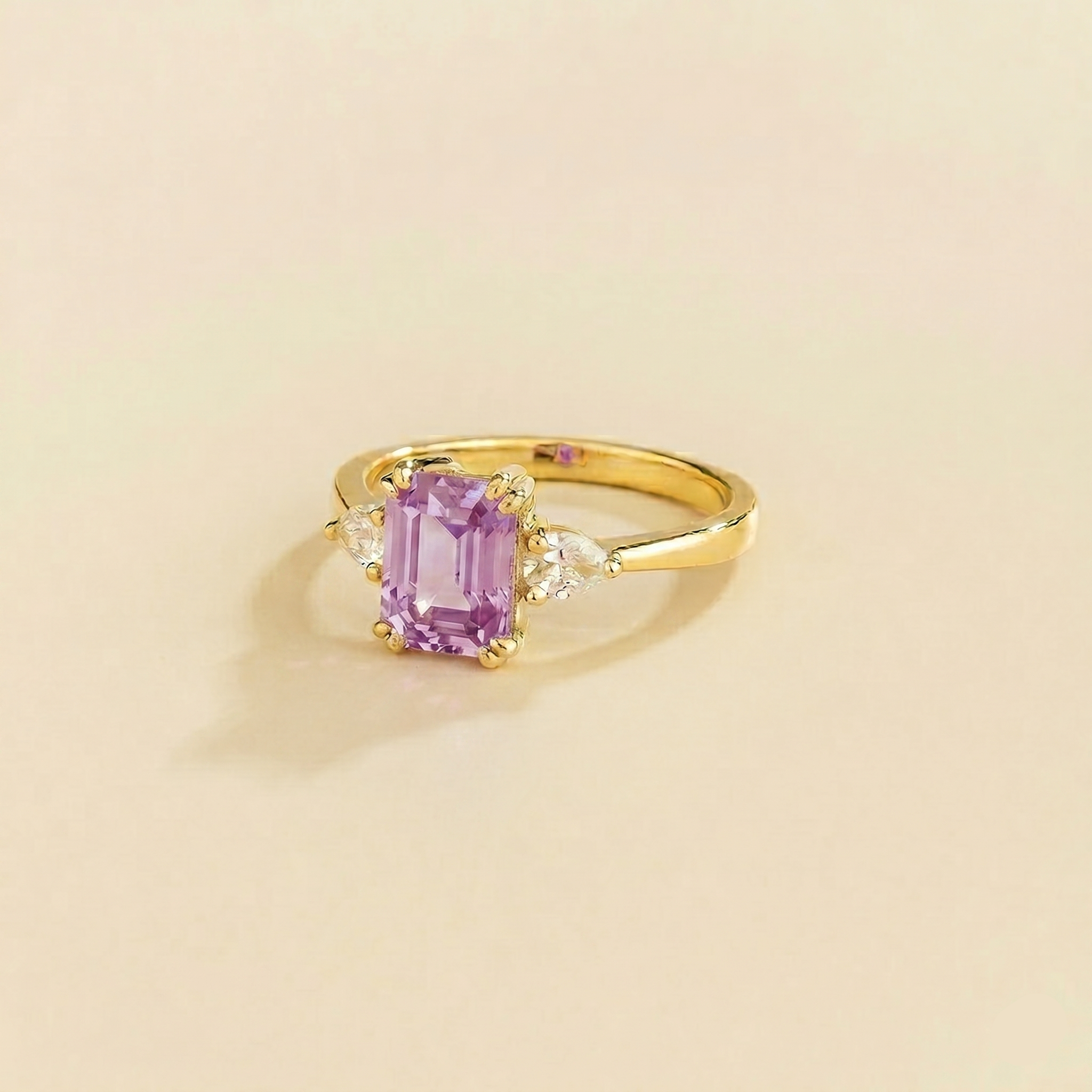 Ailes Purple Sapphire Emerald-Cut Ring with Pear Side Diamonds in Gold