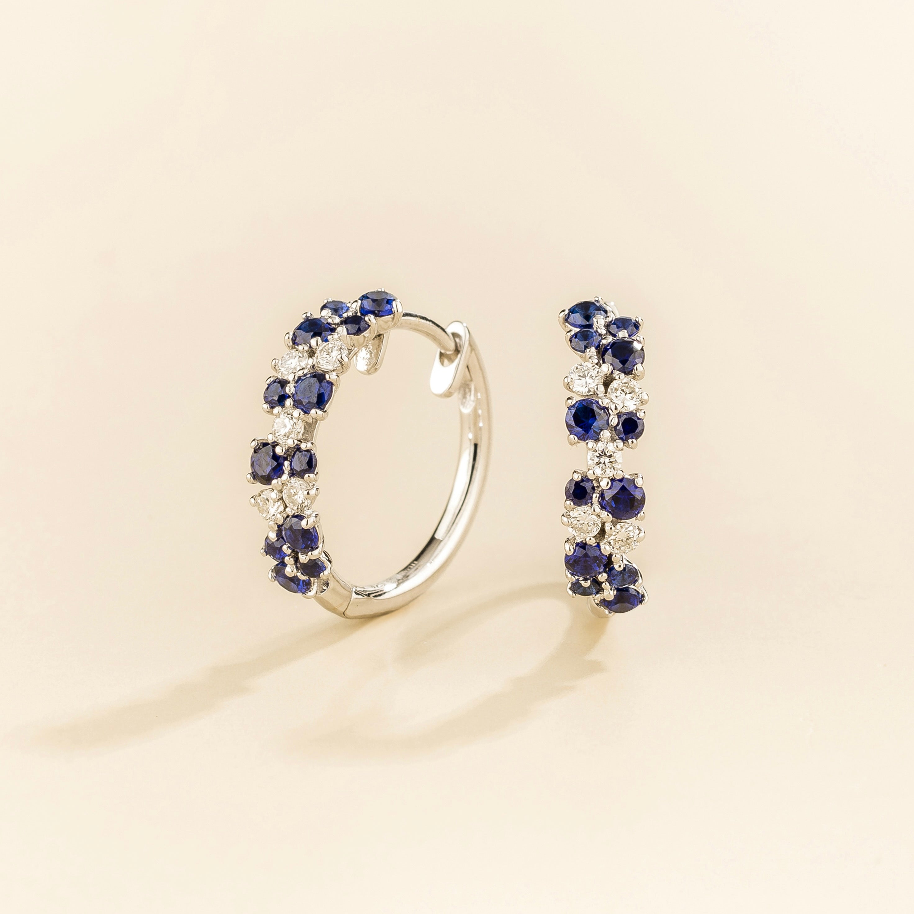 Starry Blue Sapphire & Diamond Cluster Huggie Hoop Earrings in White Gold