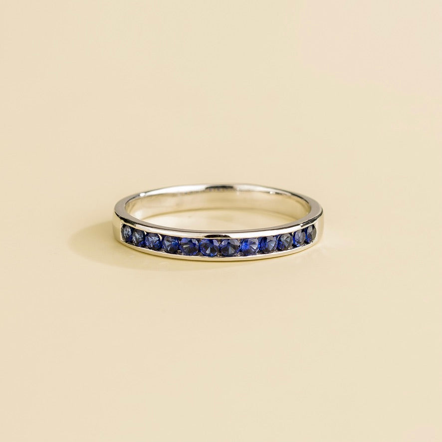 Lab-grown blue sapphire channel-set band Margo ring in white gold | Juvetti London