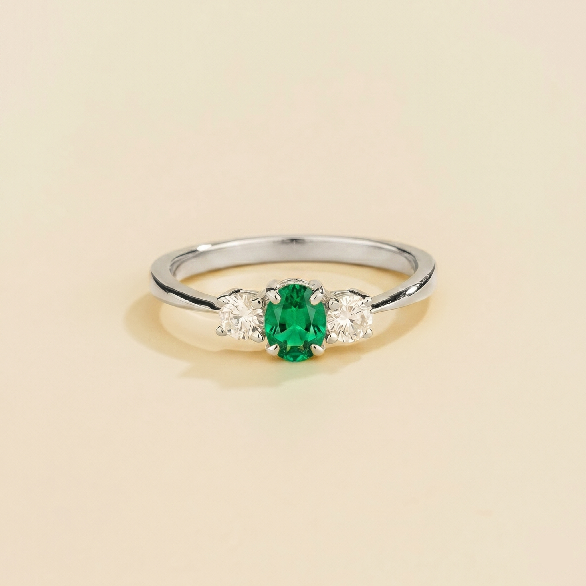 Oval lab-grown emerald and diamond three-stone Boble ring in white gold | Juvetti London