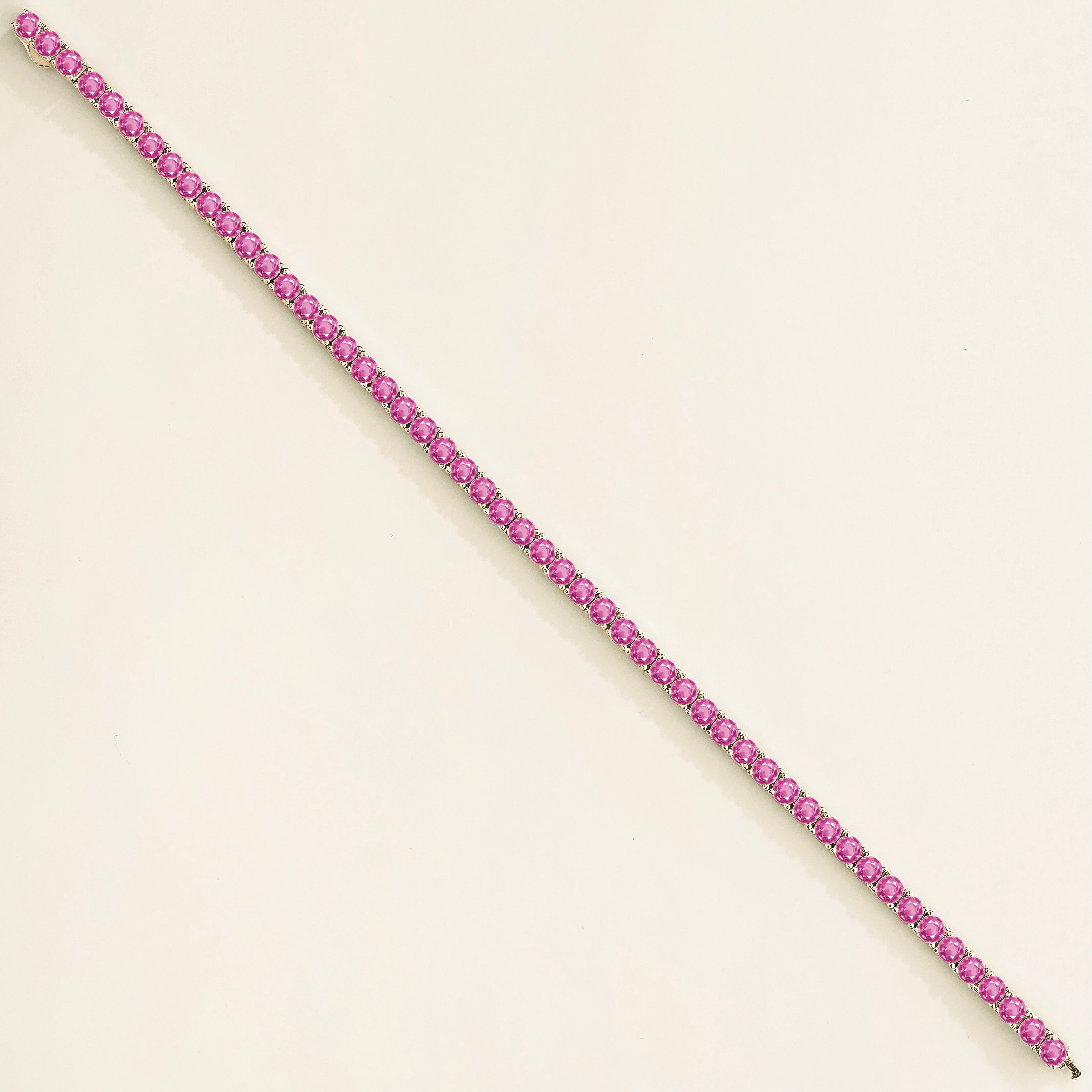 Ciclo Pink Sapphire Round Tennis Bracelet in White Gold