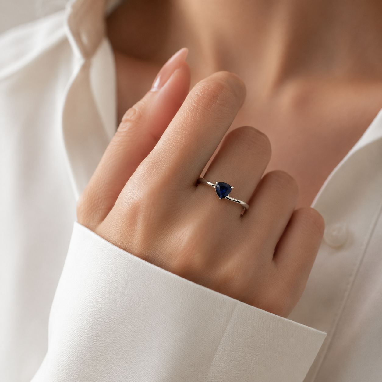 Trillion Blue Sapphire Solitaire Ring in White Gold
