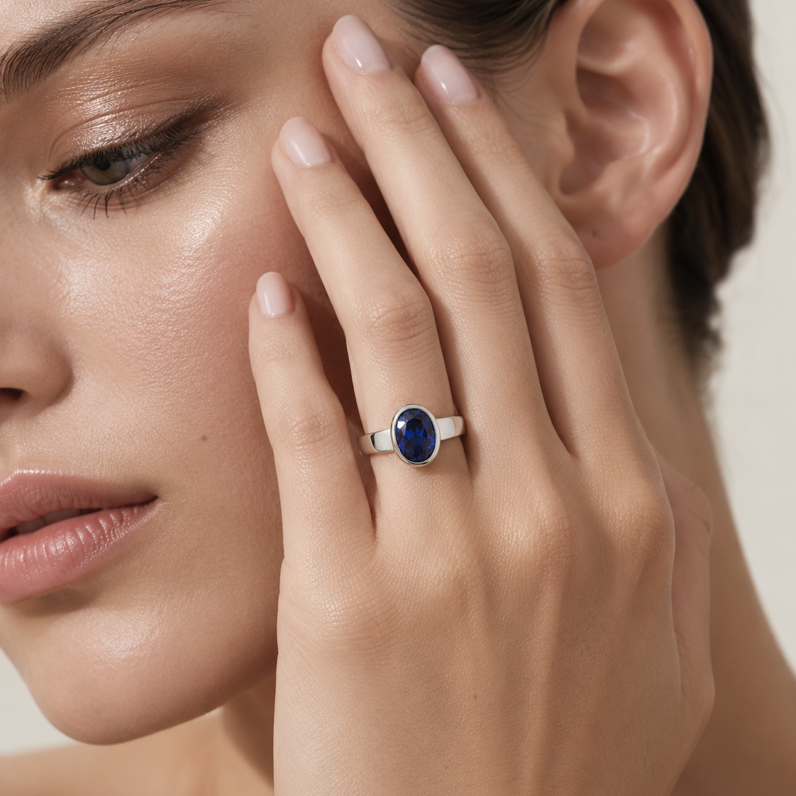 Fuerte Oval Blue Sapphire Bezel-Set Solitaire Ring in White Gold