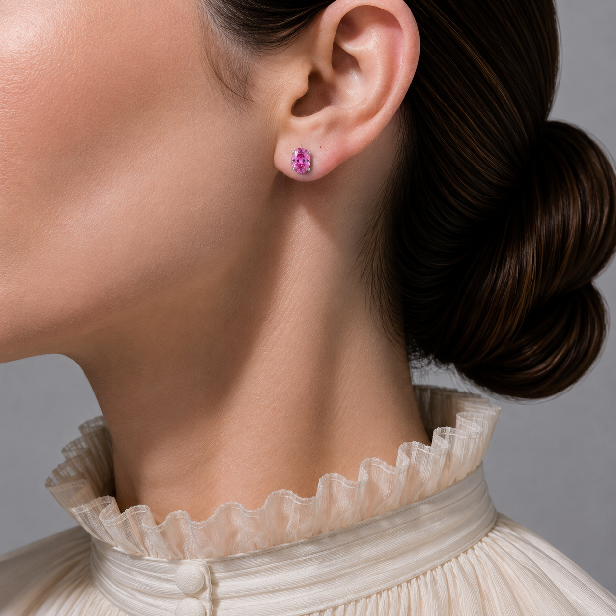 Ovo Vivid Pink Sapphire Oval Solitaire Stud Earrings in White Gold