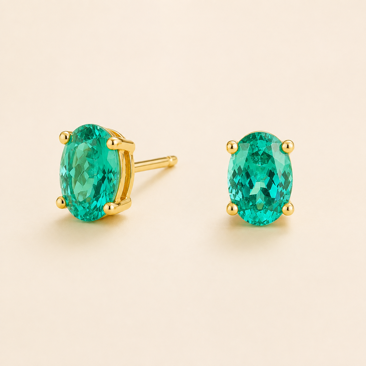Ovo Paraiba Oval Solitaire Stud Earrings in Gold Angle View