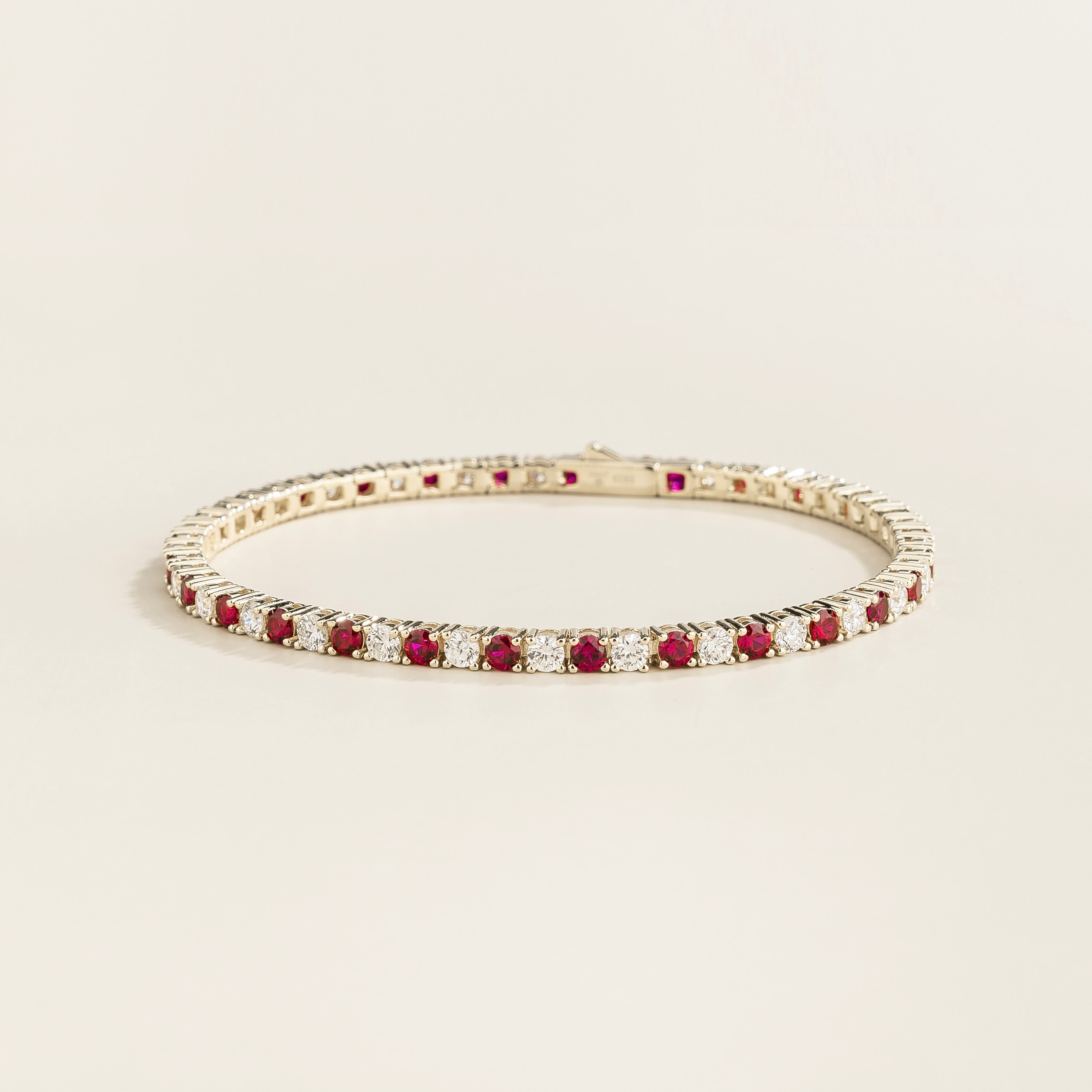 Round lab-grown ruby and diamond tennis bracelet in white gold | Juvetti London