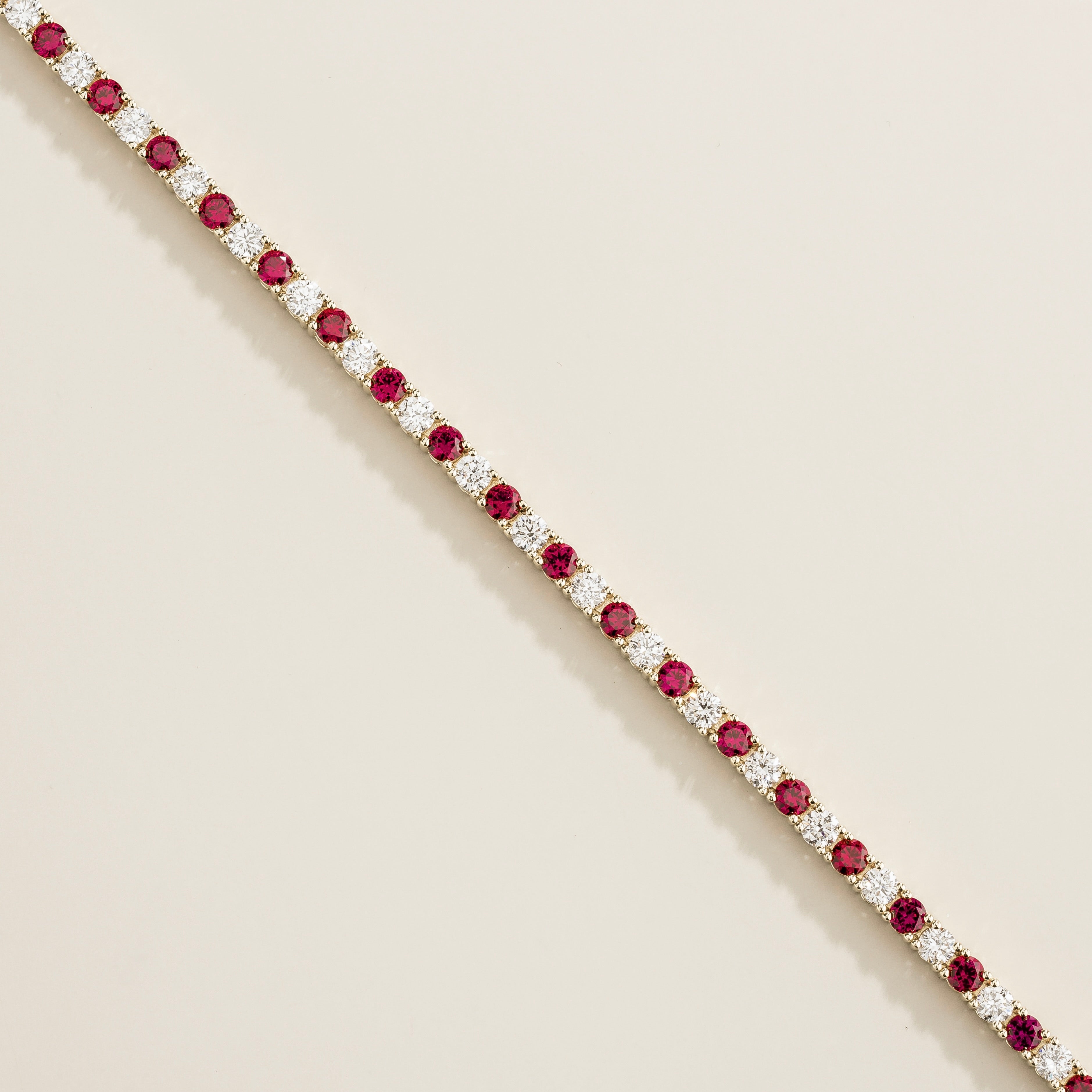 Ciclo Ruby & Diamond Round Tennis Bracelet in White Gold