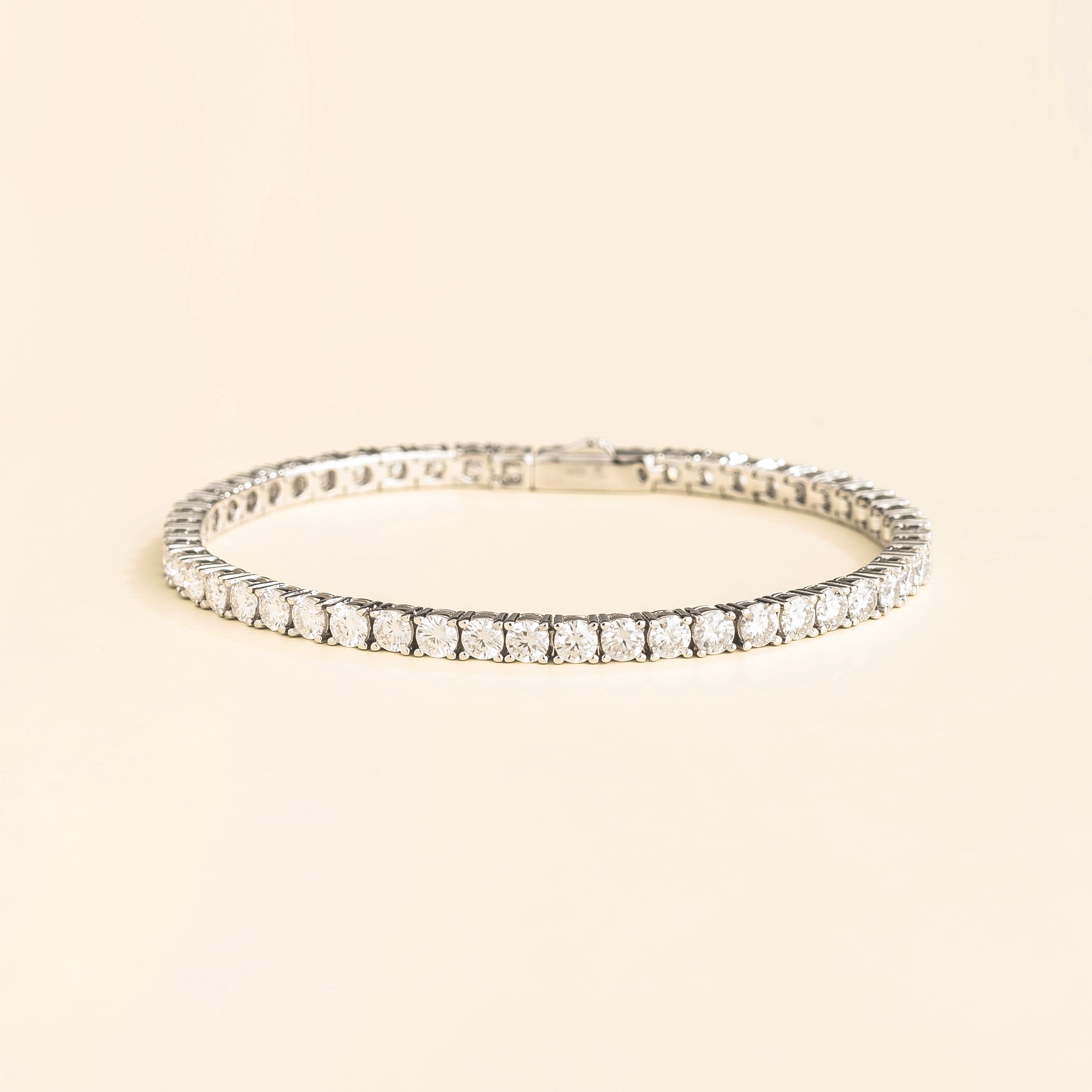ciclo white gold tennis bracelet with round cut diamonds. London jewellery store