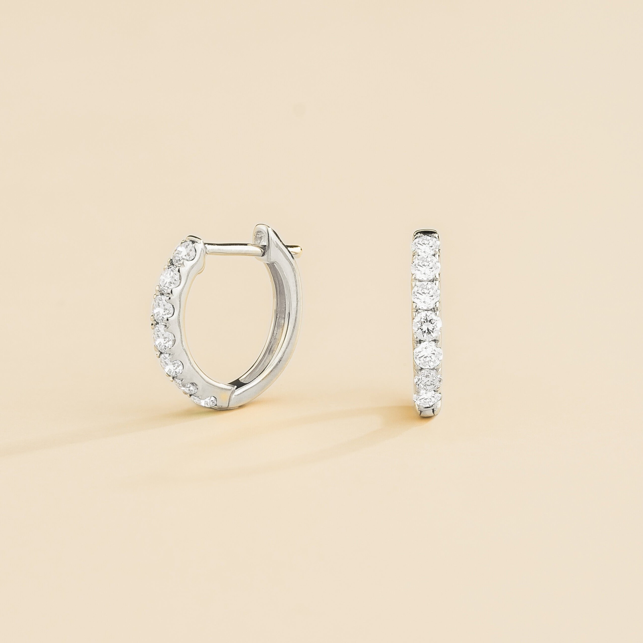 Ciclo White Gold Huggie Earrings Set With Diamonds