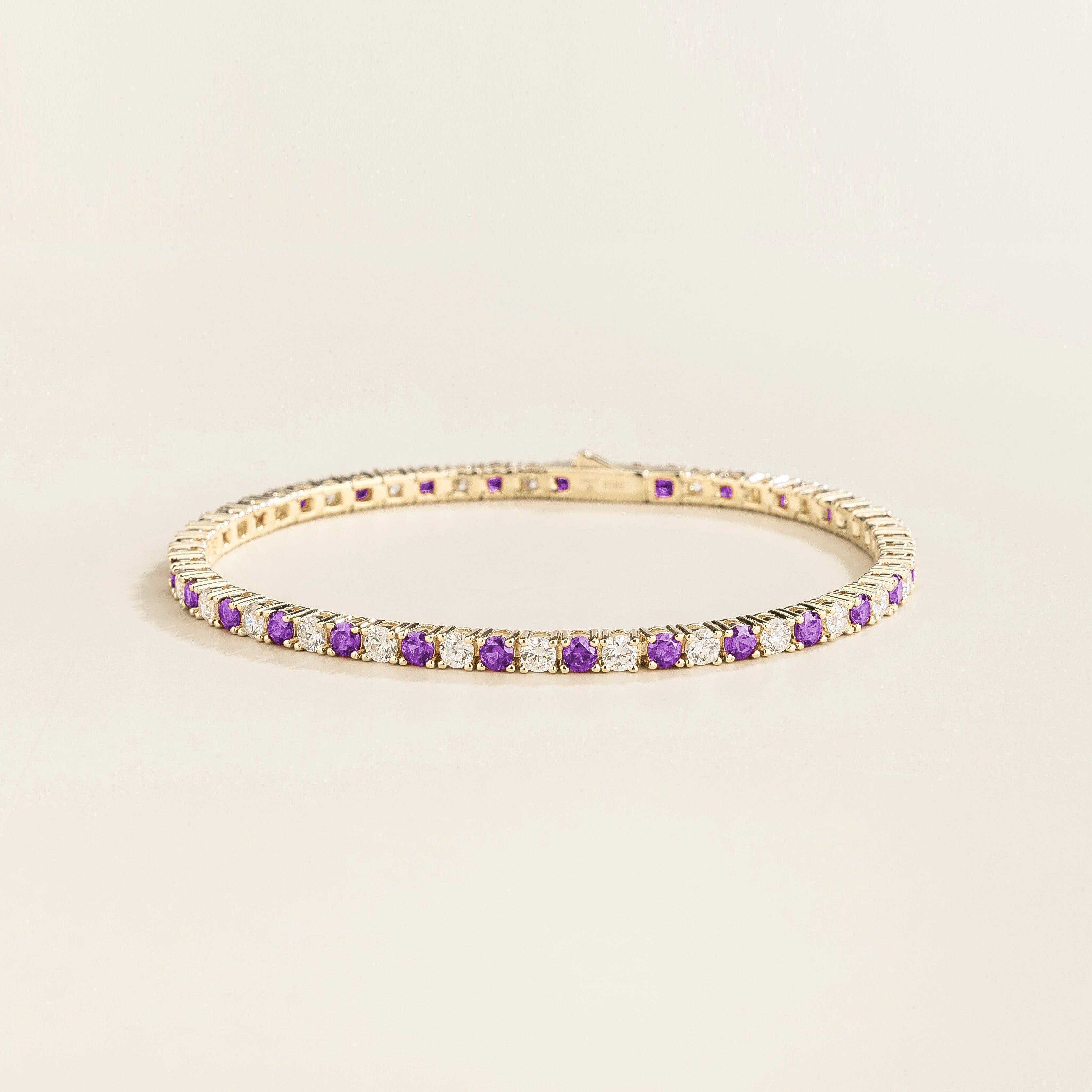 ciclo white gold tennis bracelet with round purple sapphire and lab grown diamonds