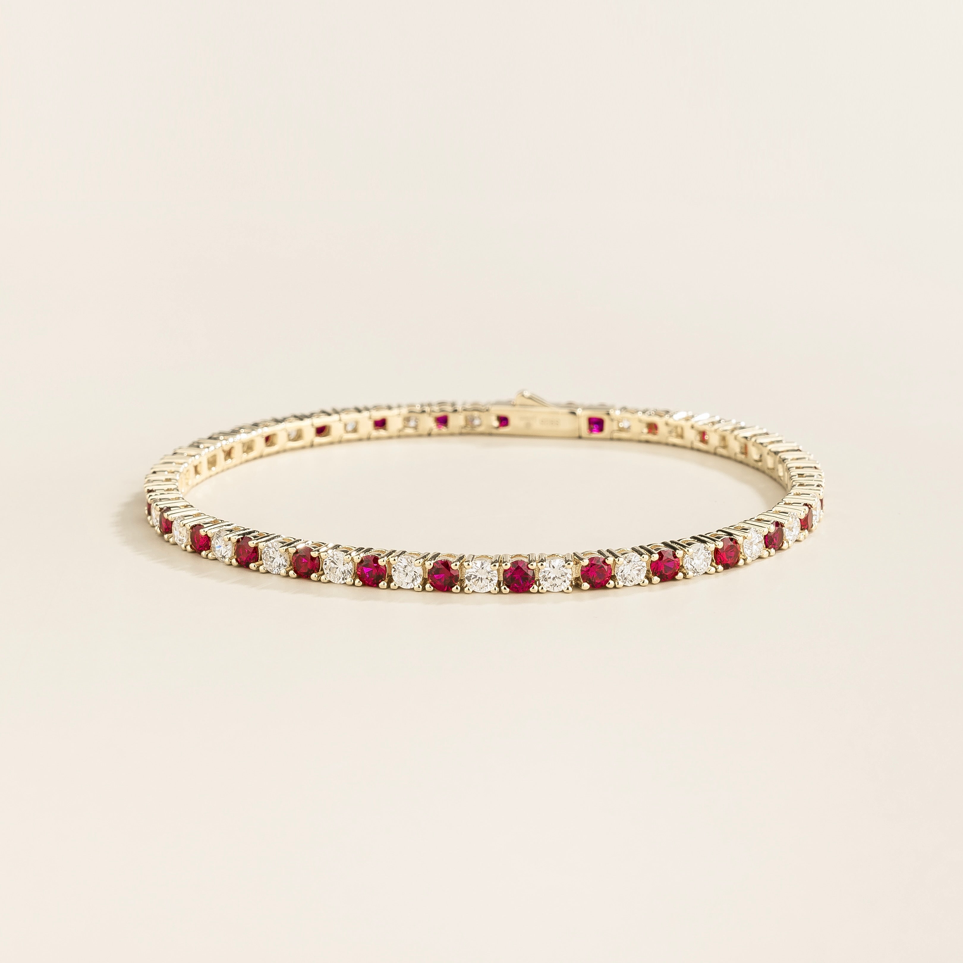 ciclo white gold tennis bracelet with round ruby and lab grown diamonds