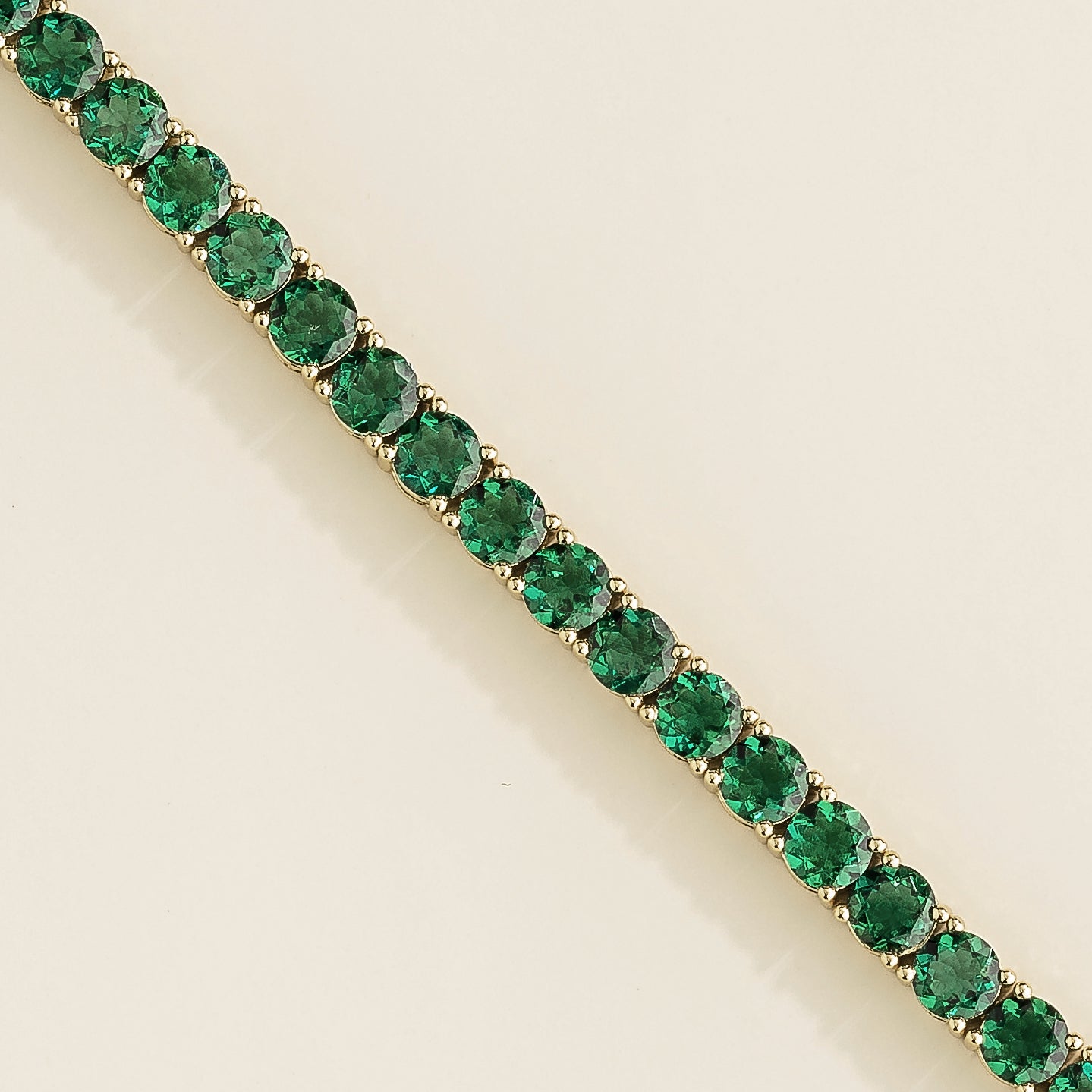 Ciclo White Gold Tennis Bracelet Set With Emerald Order Online by Juvetti Jewellery