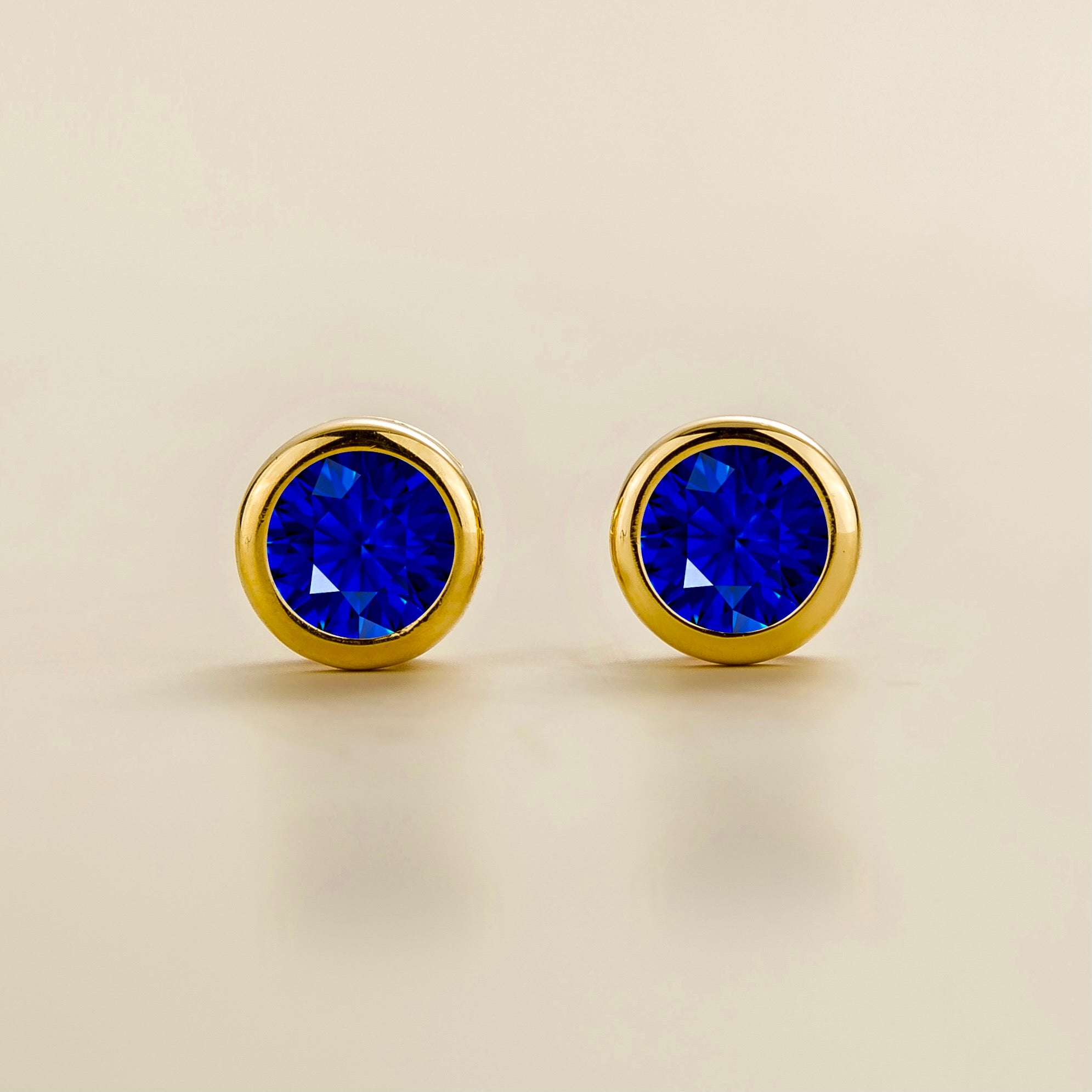 Margo Blue Sapphire Round Bazel Set Gold Earrings