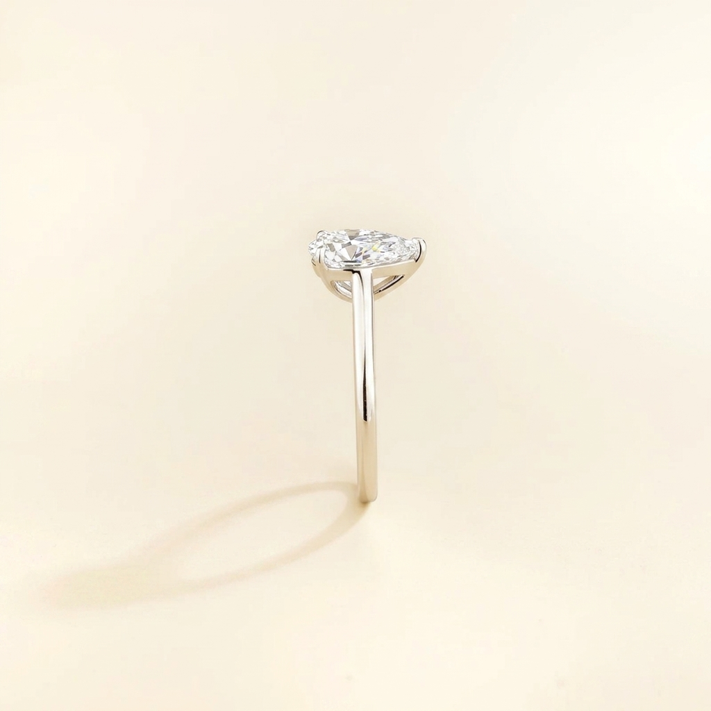Pandal Pear Shape Diamond Cathedral Solitaire Ring in White Gold